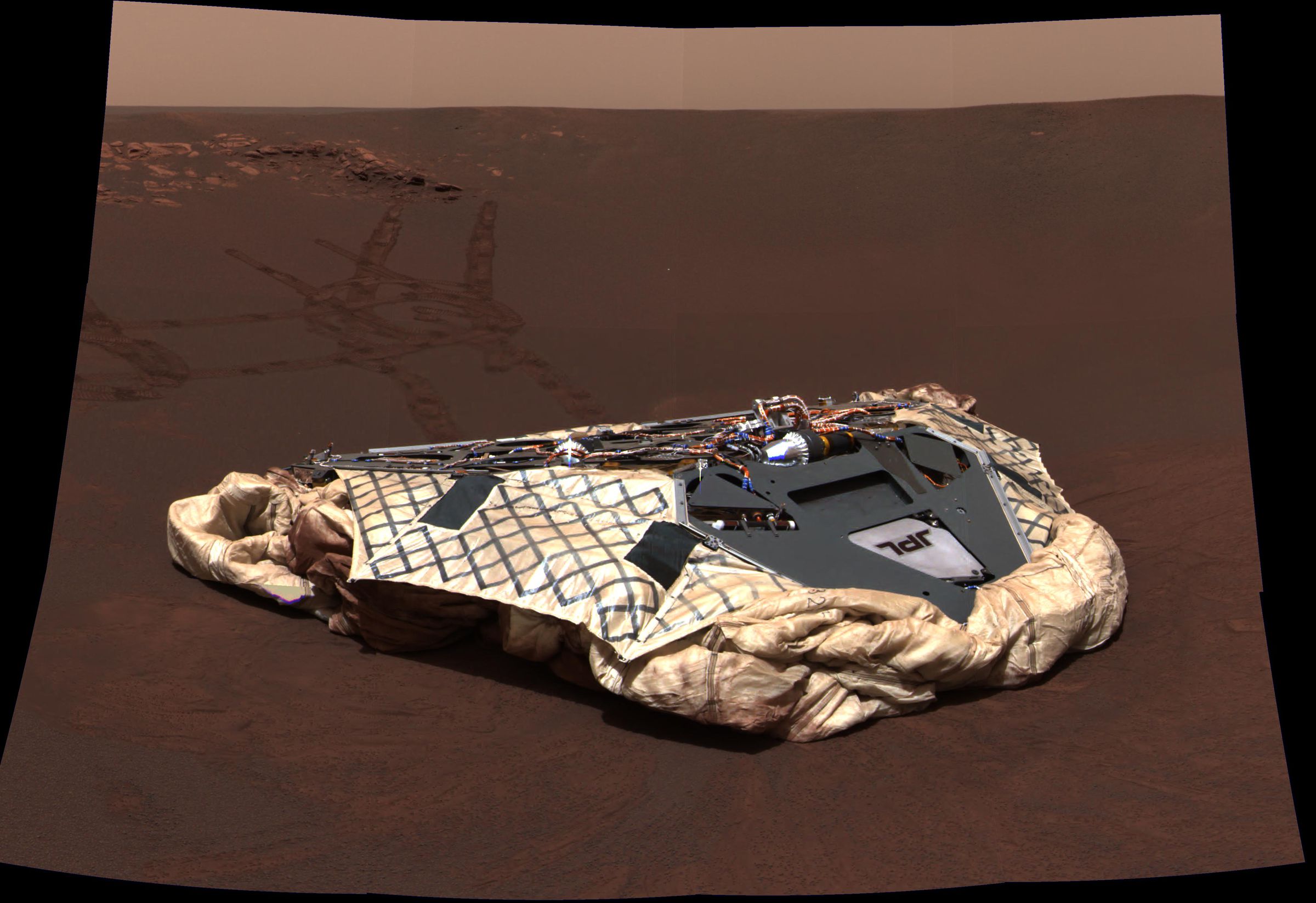 Twenty-four Martian days after Opportunity landed, it took this picture of what NASA called its “empty nest” — all the gear that helped keep Opportunity safe during its landing.