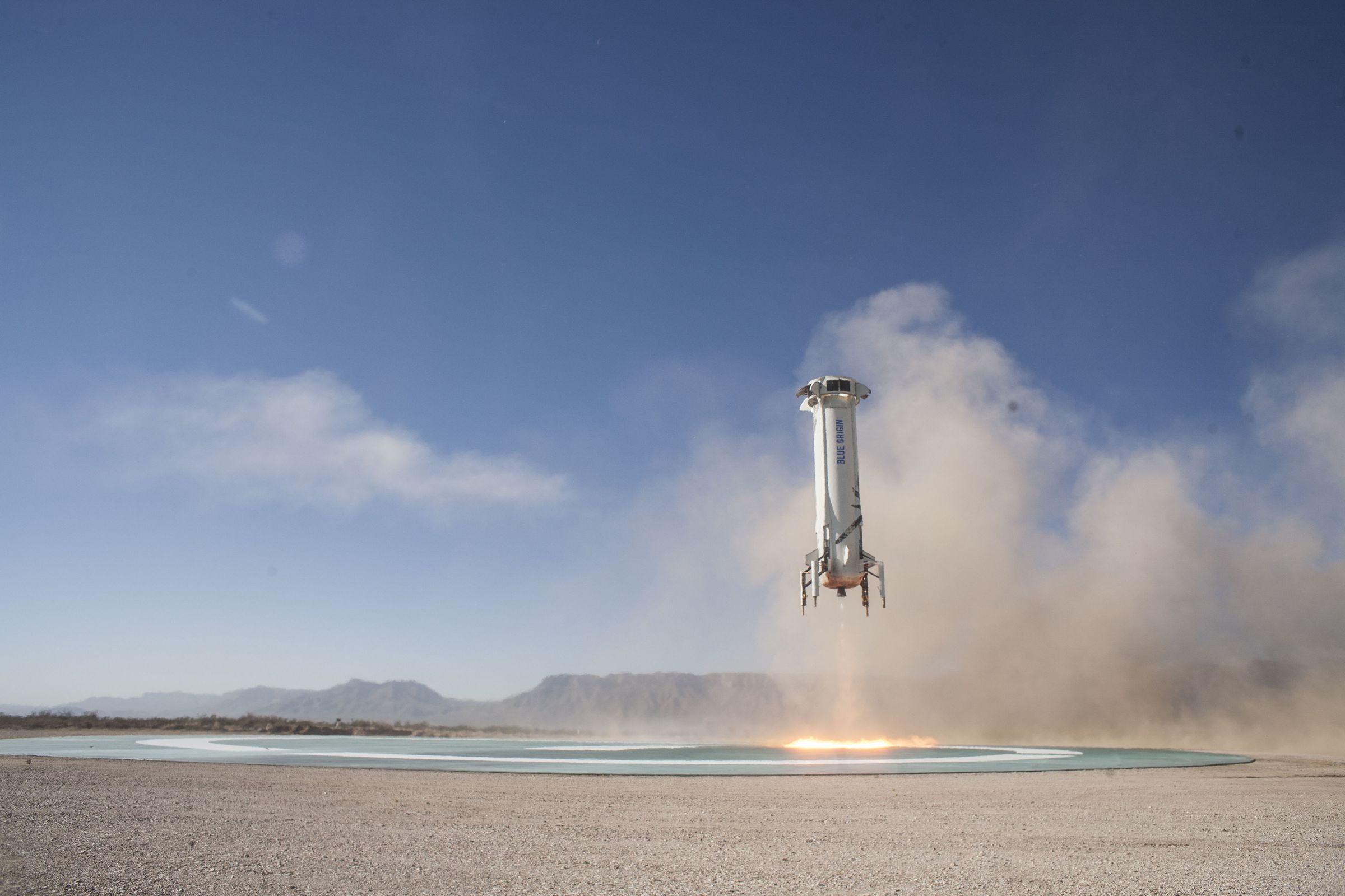 New Shepard Booster landing on the pad in West Texas.