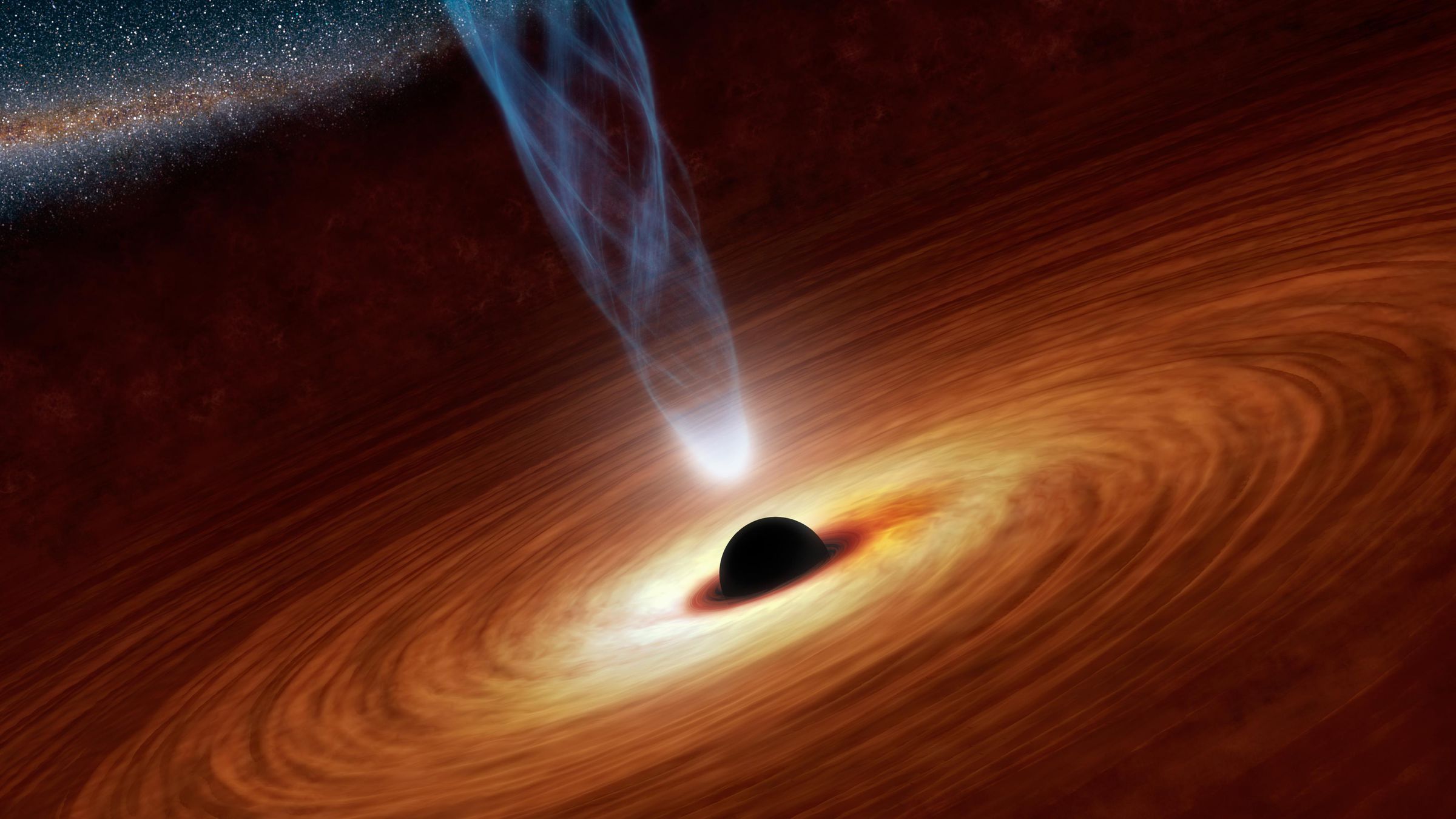 An artistic rendering of a black hole, surrounded by a swirling disc of hot gas and plasma