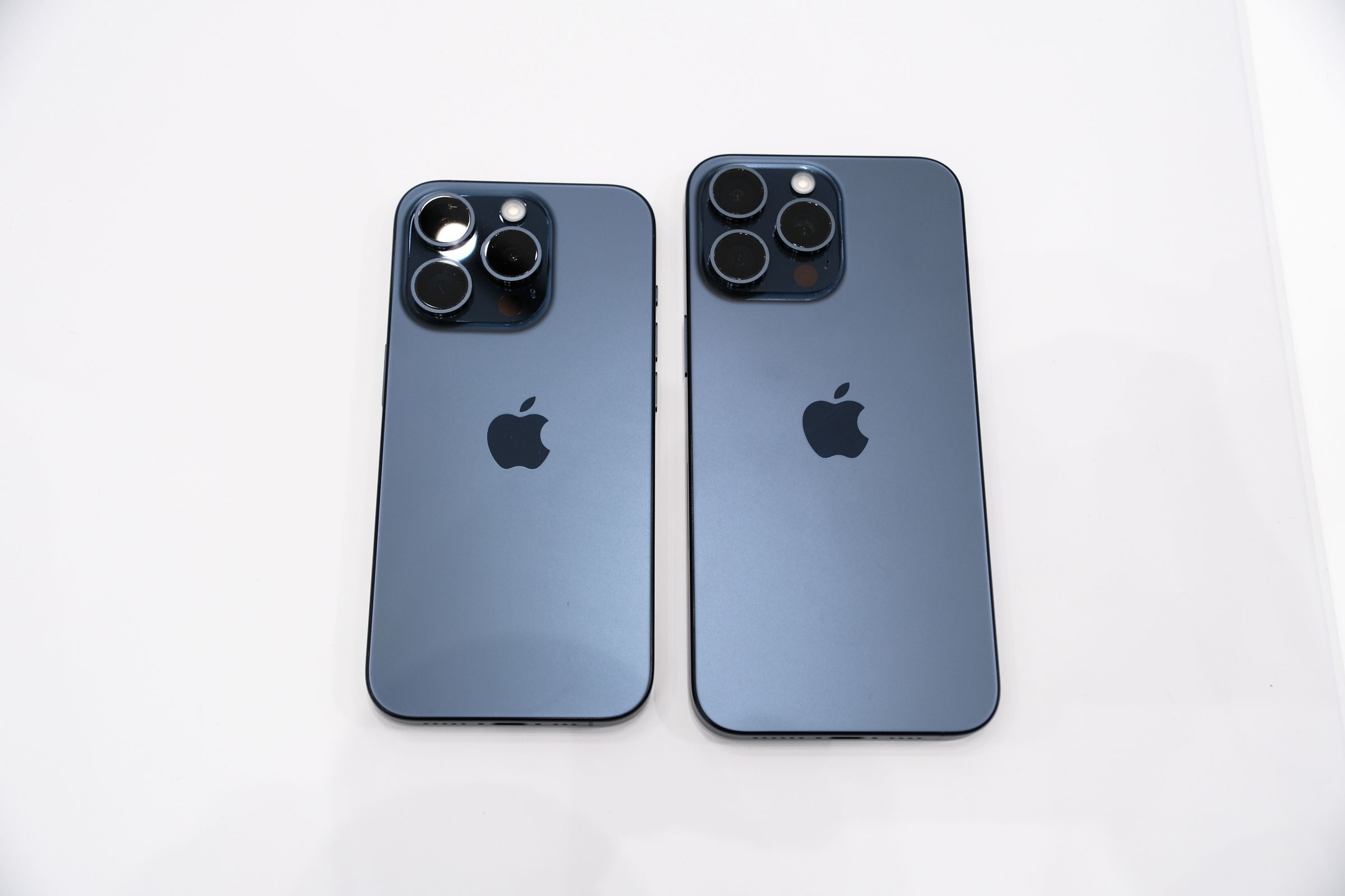 Apple iPhone 15 Pro and Pro Max in blue titanium