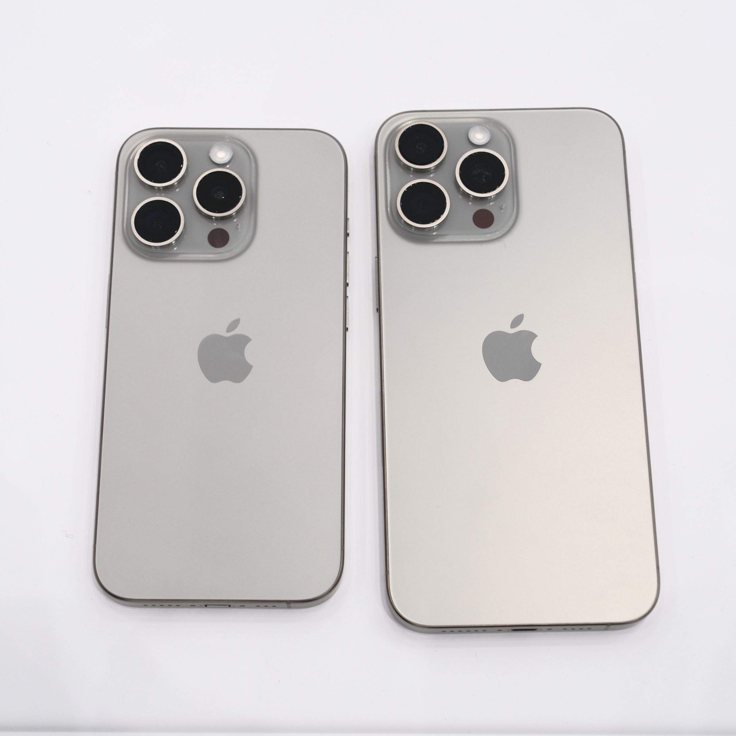 Apple iPhone 15 Pro and Pro Max in natural titanium