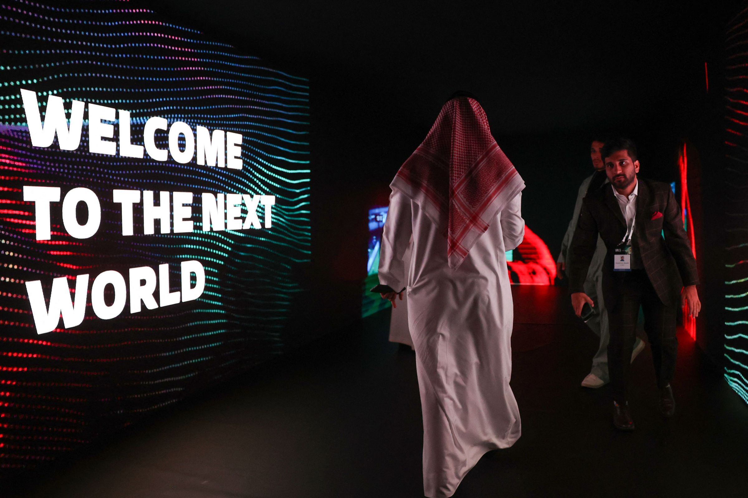 People attend the International E-Sport Gamers forum “Next World”, in the Saudi capital Riyadh, on September 7, 2022. - Much like with Formula One and professional golf, Saudi Arabia, the world’s biggest oil exporter has in recent years leveraged its immense wealth to assert itself on the eSports stage, hosting glitzy conferences and snapping up established tournament organisers.&nbsp;