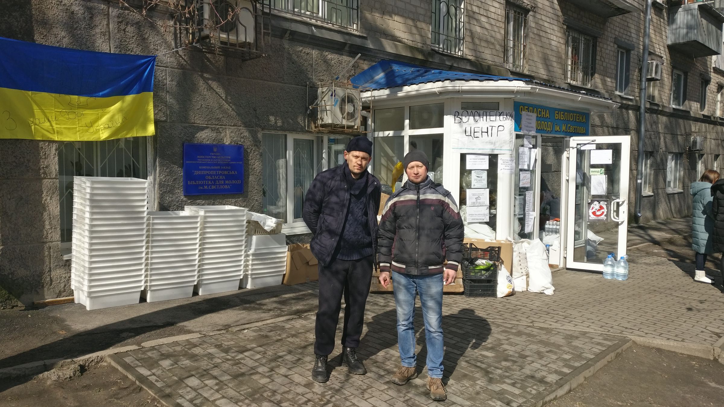 Oleksandr Pypka (left), a mathematics professor, and Vitalii Palchykov (right), an organic chemist, both of Dnipro National University, at a volunteer center in Dnipro, Ukraine, on March 7, 2022.