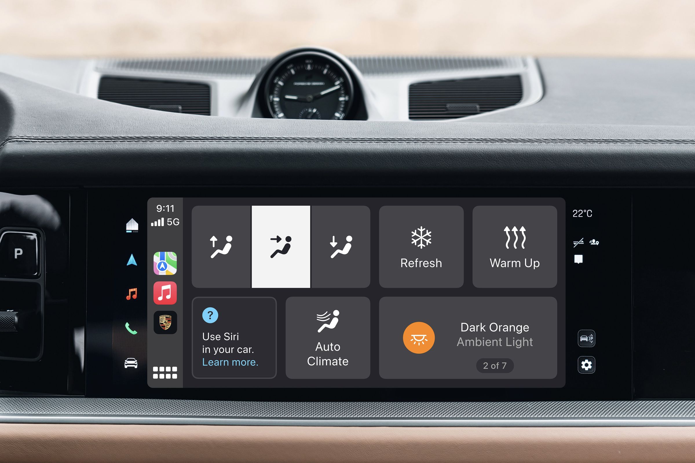 Porsche Cayenne CarPlay interface with climate buttons and an interior lighting mood adjuster