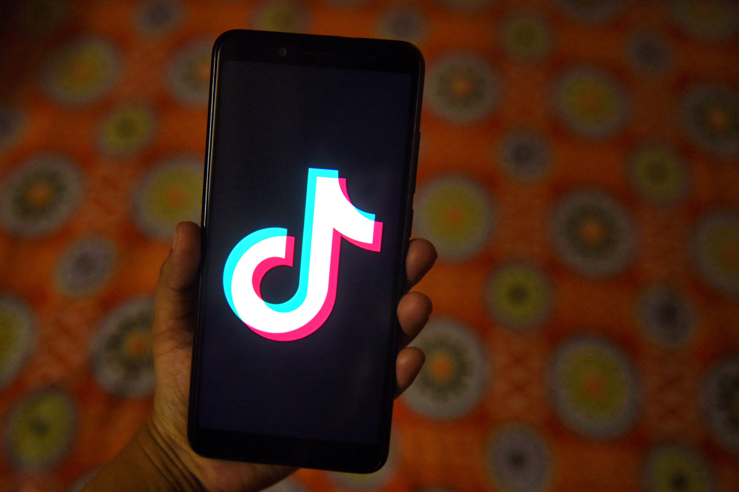 The tiktok application sign seen on a screen of an Android...