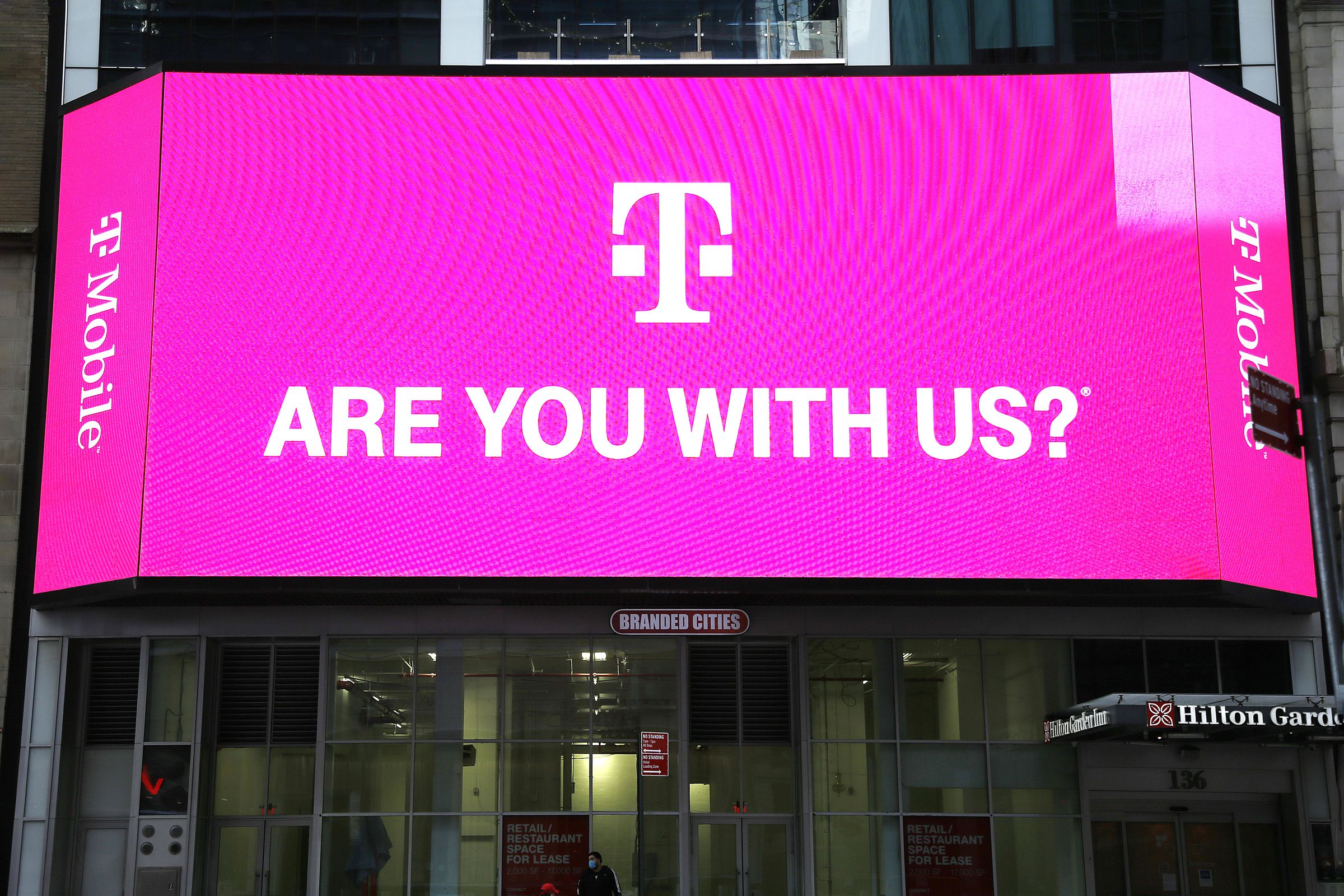 T-Mobile network advertises seen on a Jumbotron in Times...
