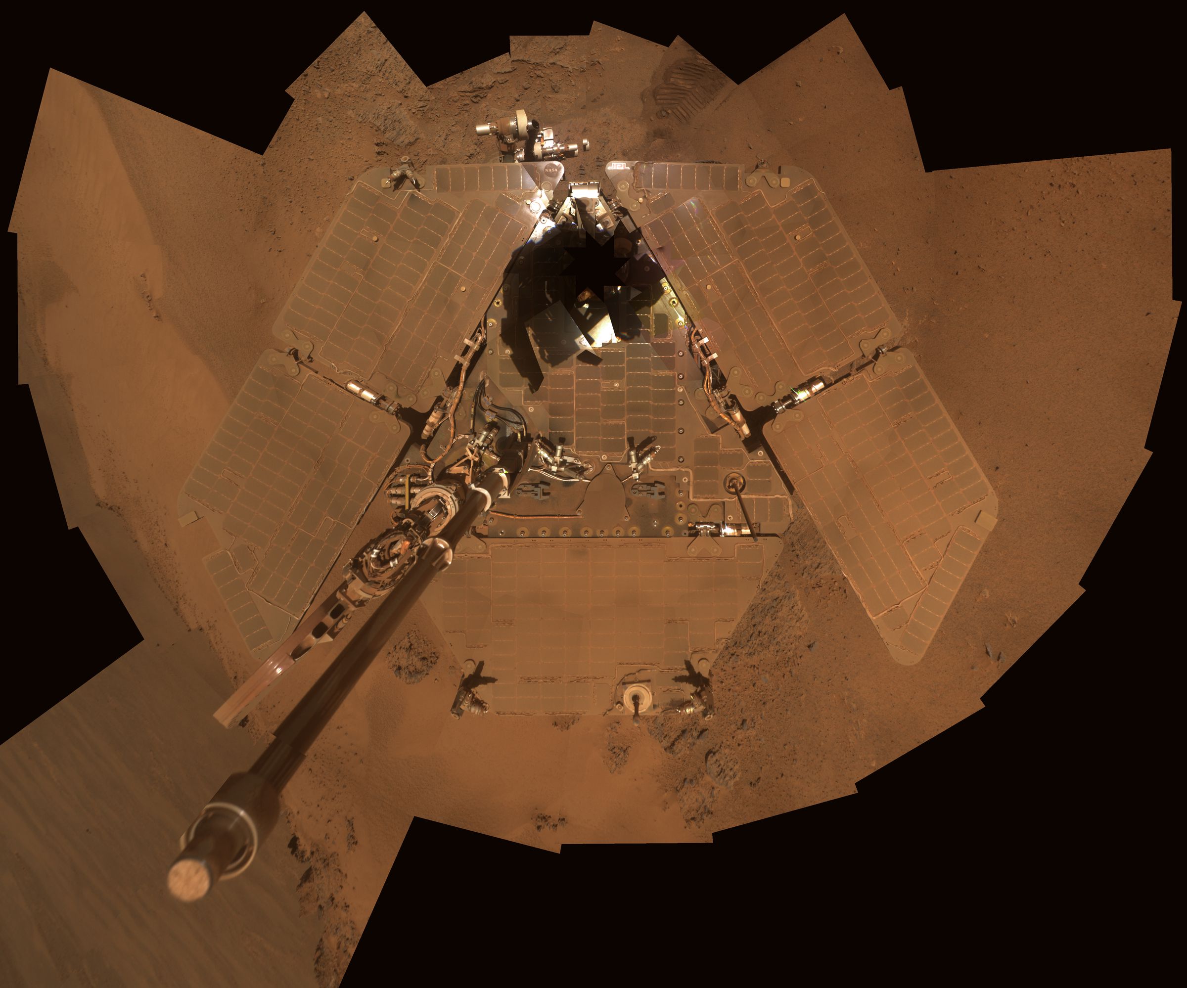 A selfie taken in 2011 shows dust coating the rover’s solar panels. During dust storms, the amount of power the rover could generate was severely reduced, and engineers had to wait for wind to clear the dust from the panels