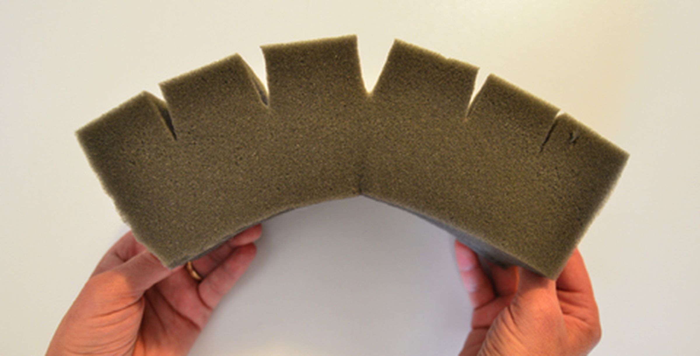 Corning uses foam to easily illustrate why a crack might be a problem when bending.