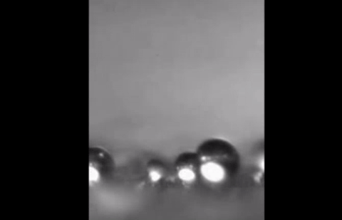 Video showing water droplets bouncing off a super-hydrophobic surface.