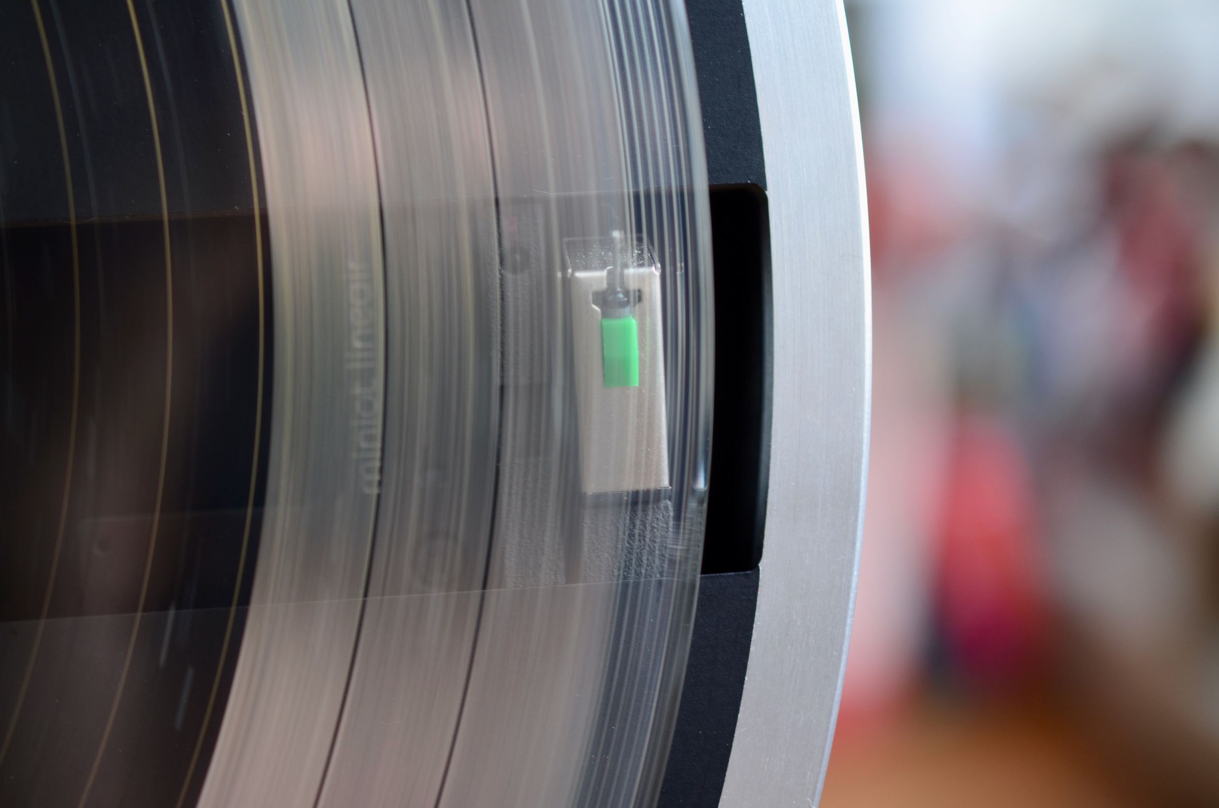 The Wheel 2 spins the record counter-clockwise and plays the bottom of the record.