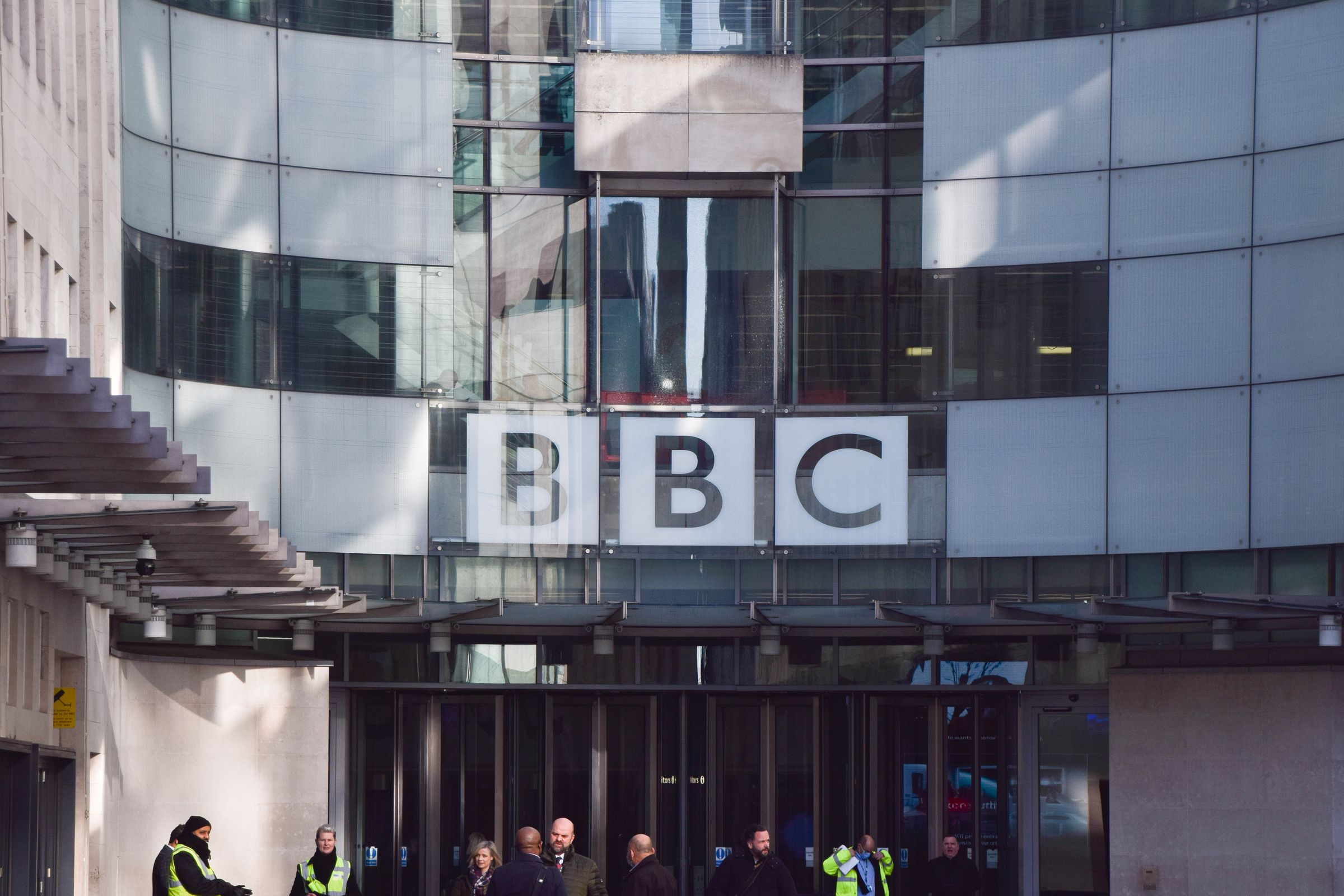 The BBC logo is seen at the entrance at Broadcasting House,...
