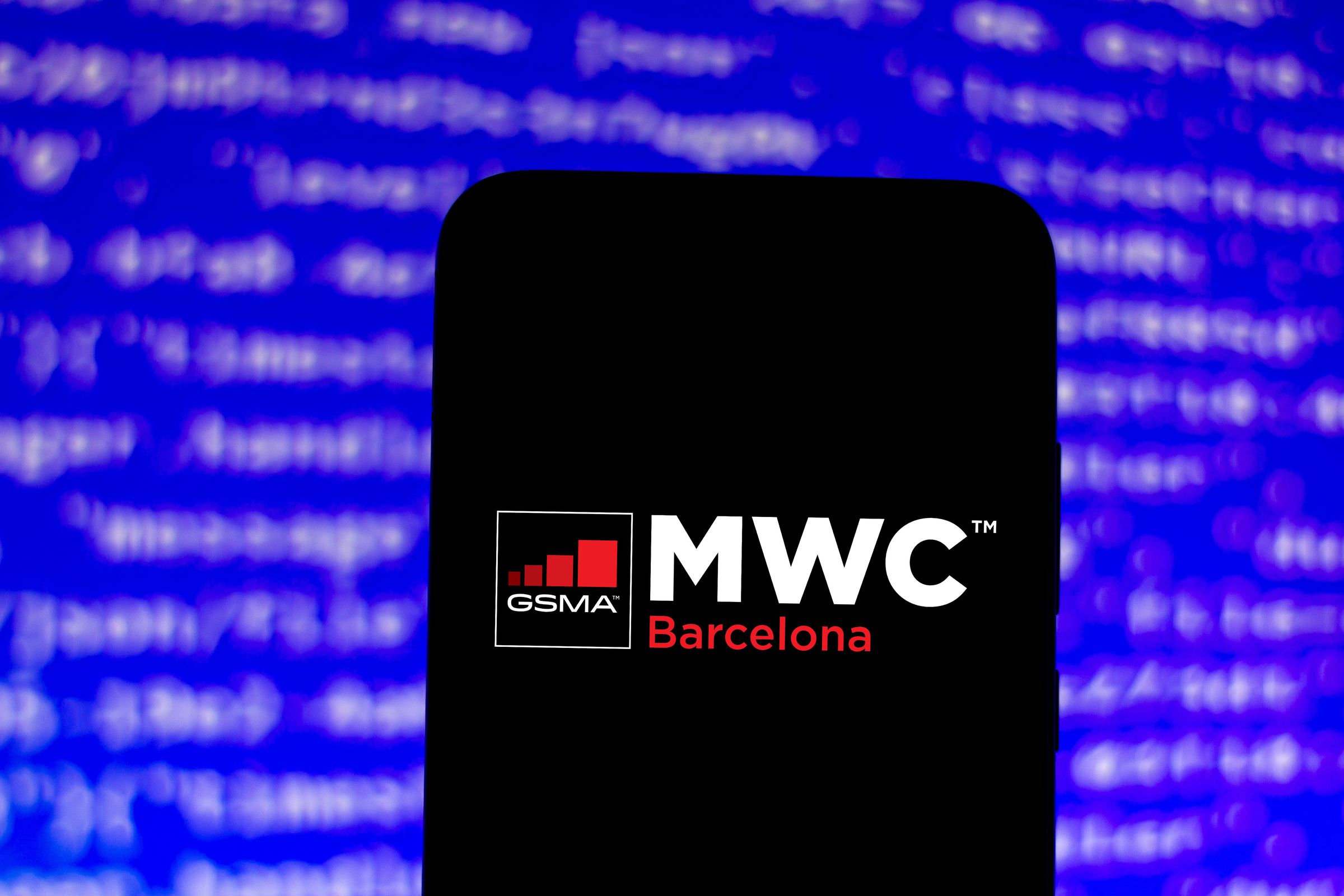 In this photo illustration the GSMA Mobile World Congress (...