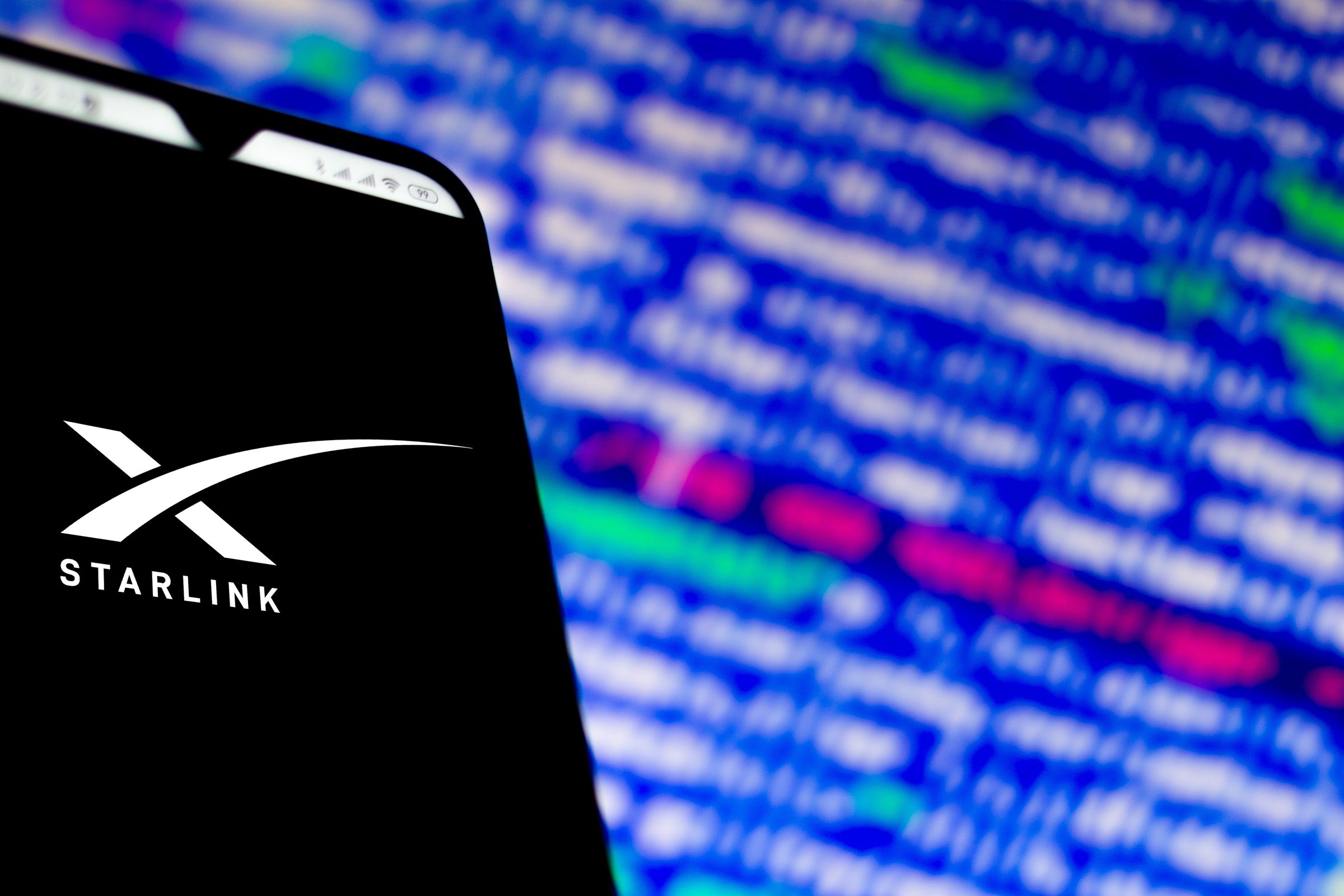 In this photo illustration a Starlink (SpaceX) logo app seen...