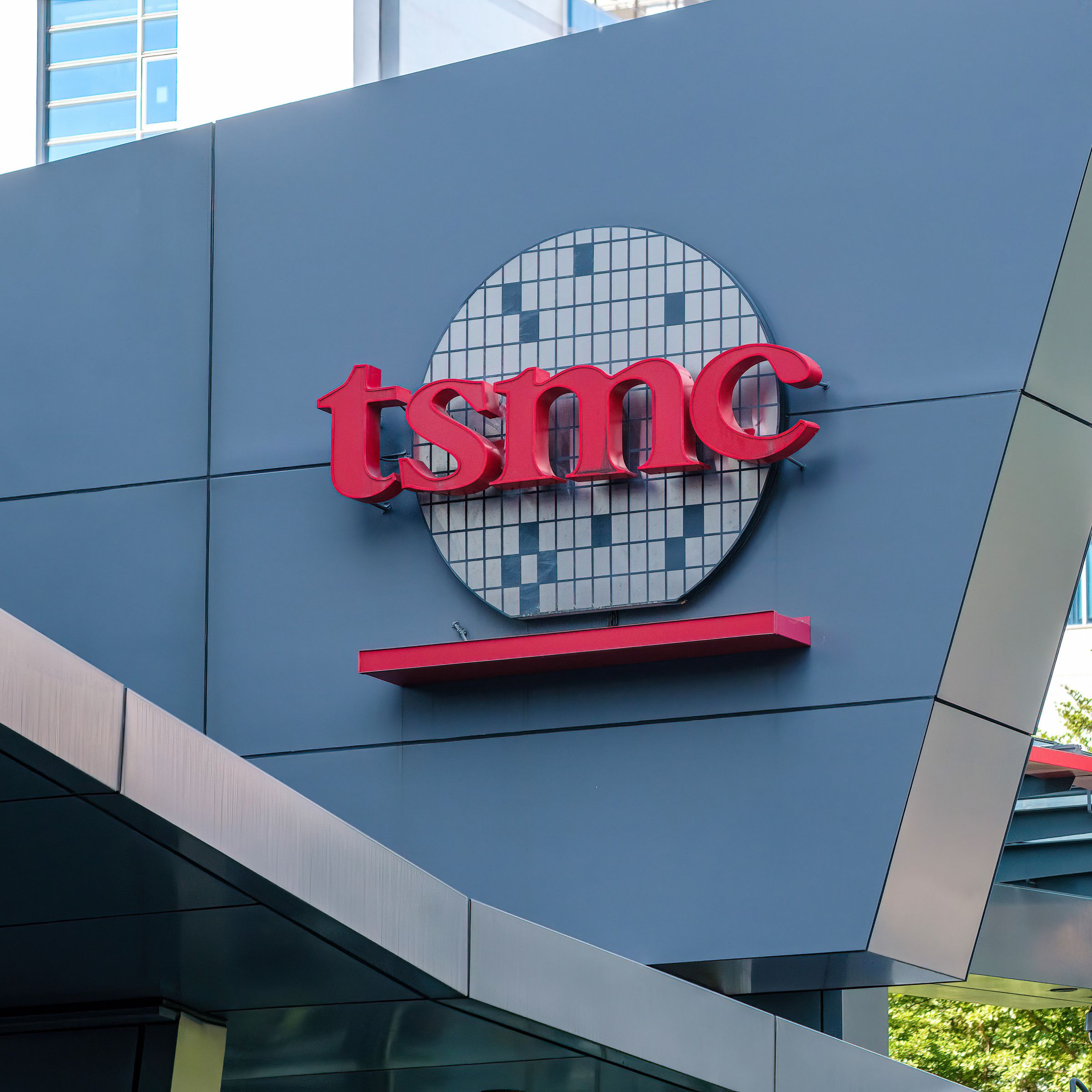 The TSMC (Taiwan Semiconductor Manufacturing Company) logo...