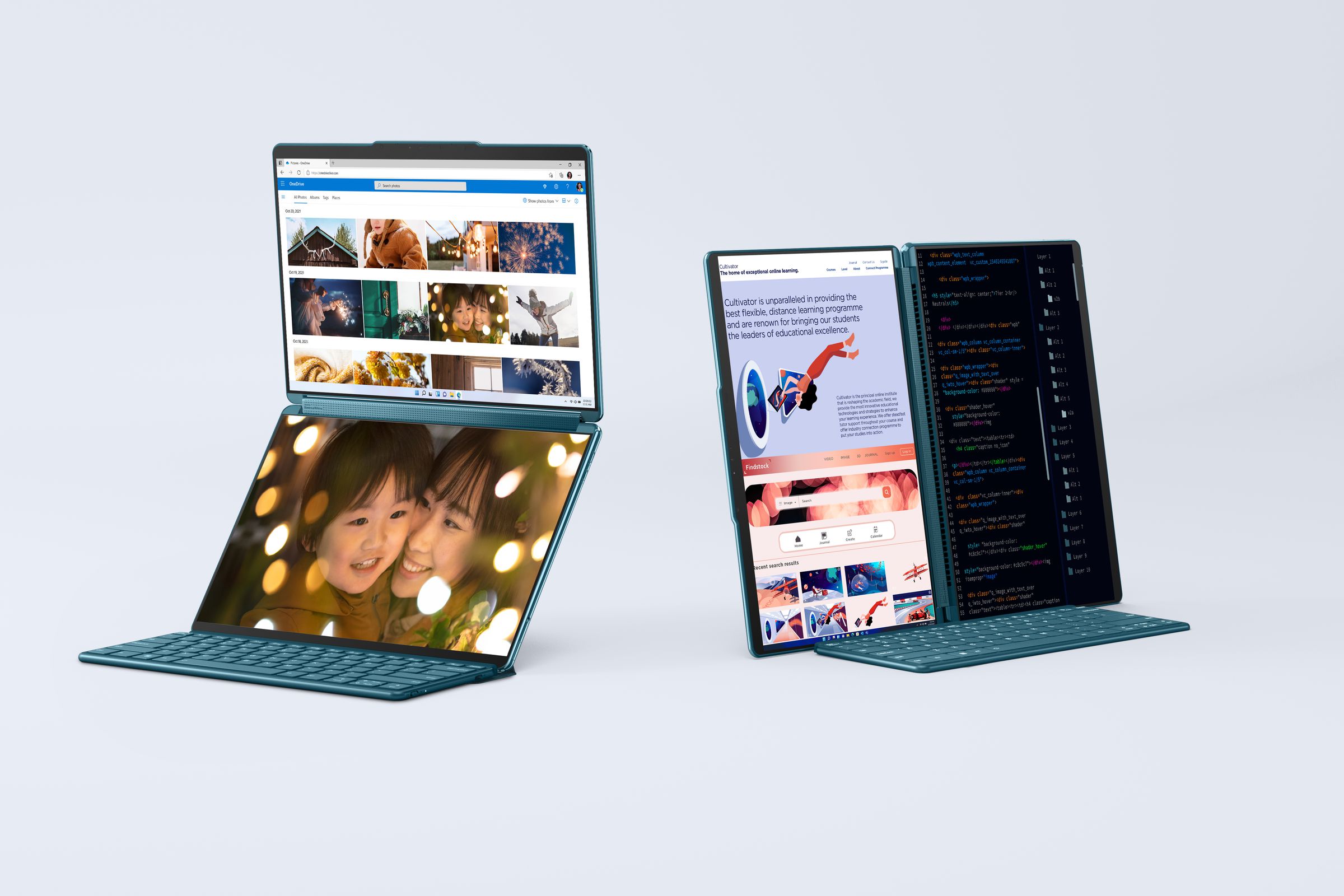 Two of the dual-monitor Yoga Book 9i laptops sitting side by side. One is open in a vertical orientation with the two screens stacked atop one another and the keyboard magnetically attached on the bottom. The other has the screens side by side like a large book, with the keyboard attached in front at the base.
