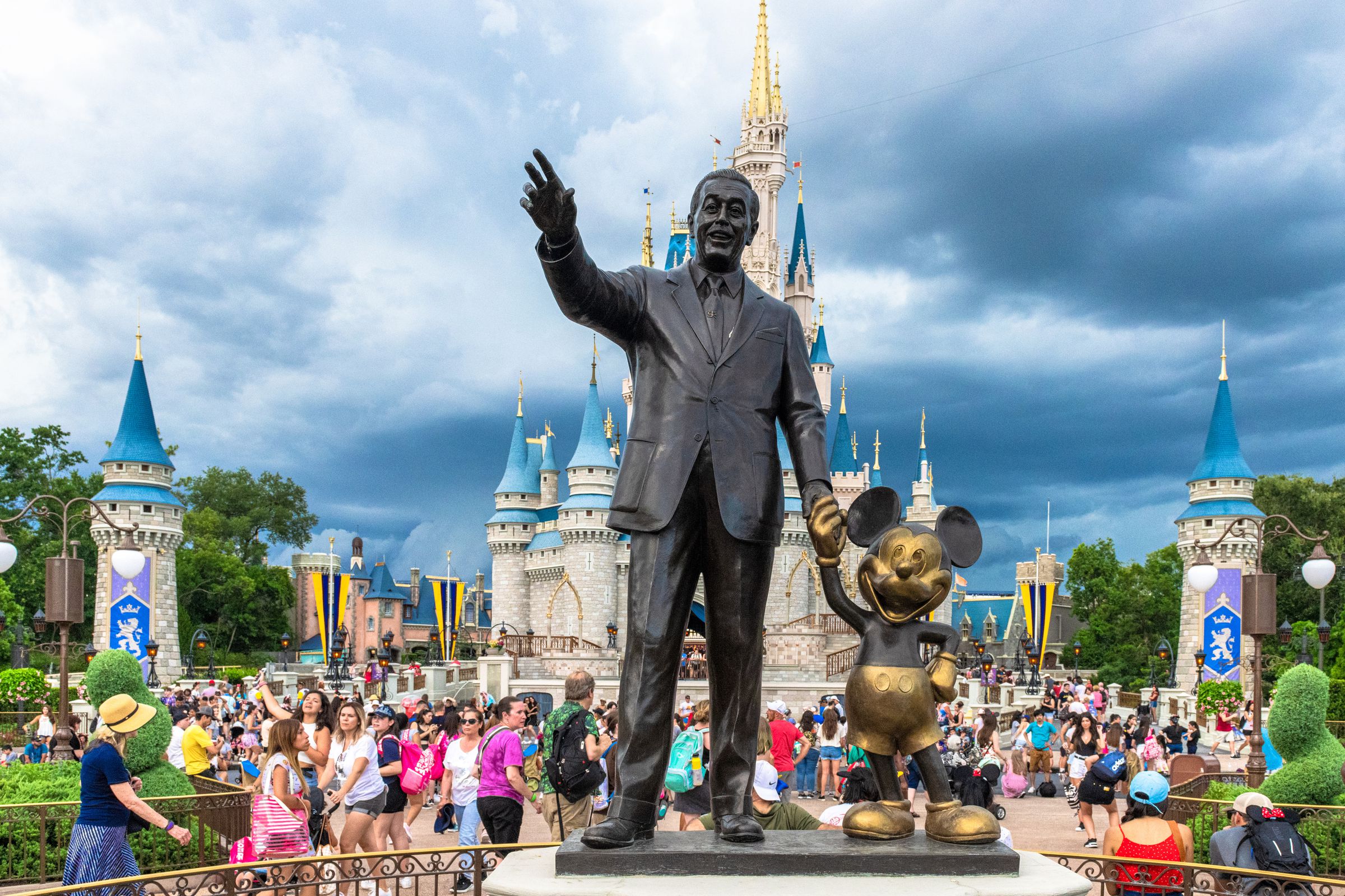 Walt Disney and Mickey Mouse statue inside of the Magic...