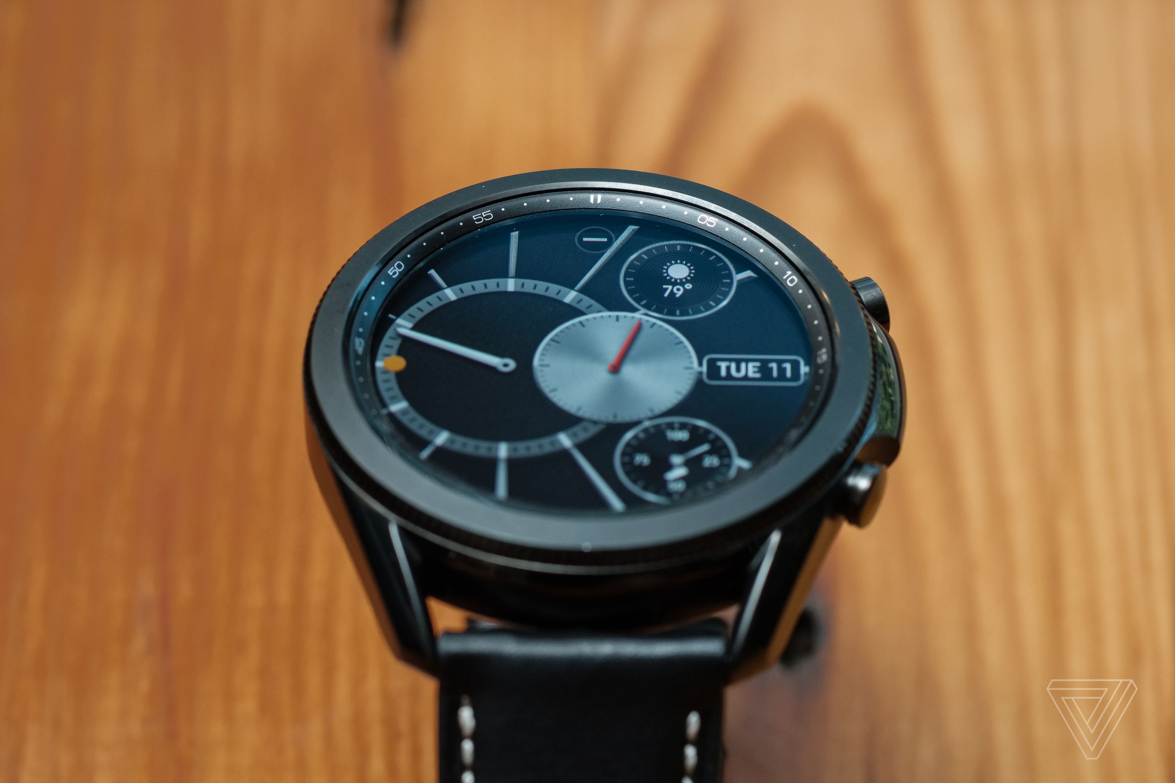 The rotating bezel is not flush with the Watch 3’s display, which makes the watch thicker overall.