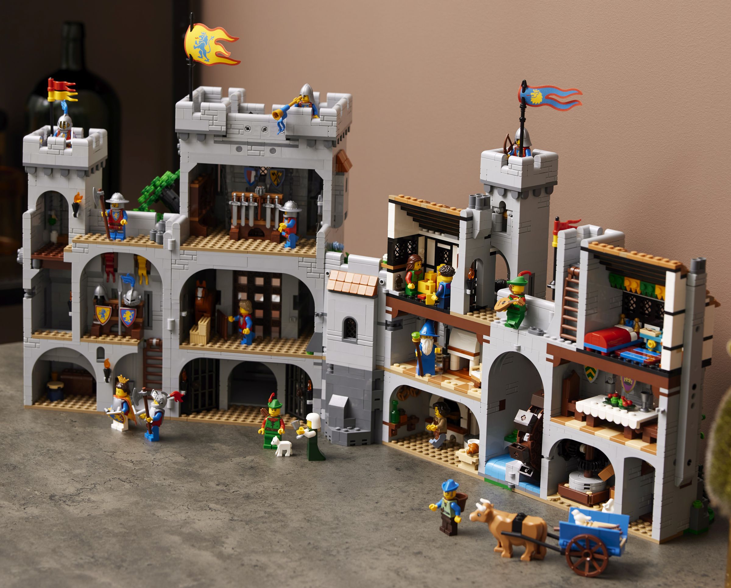 The designers say you can connect up to 100 of these sets into a giant castle (maybe at a con?) That’s probably what the Technic holes on the sides are for.