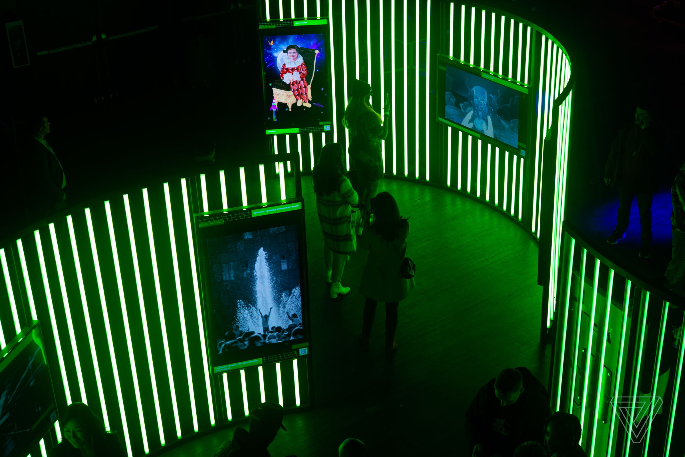At the center of the Dreamverse gallery was a series of TVs mounted on color-changing tubes of light.