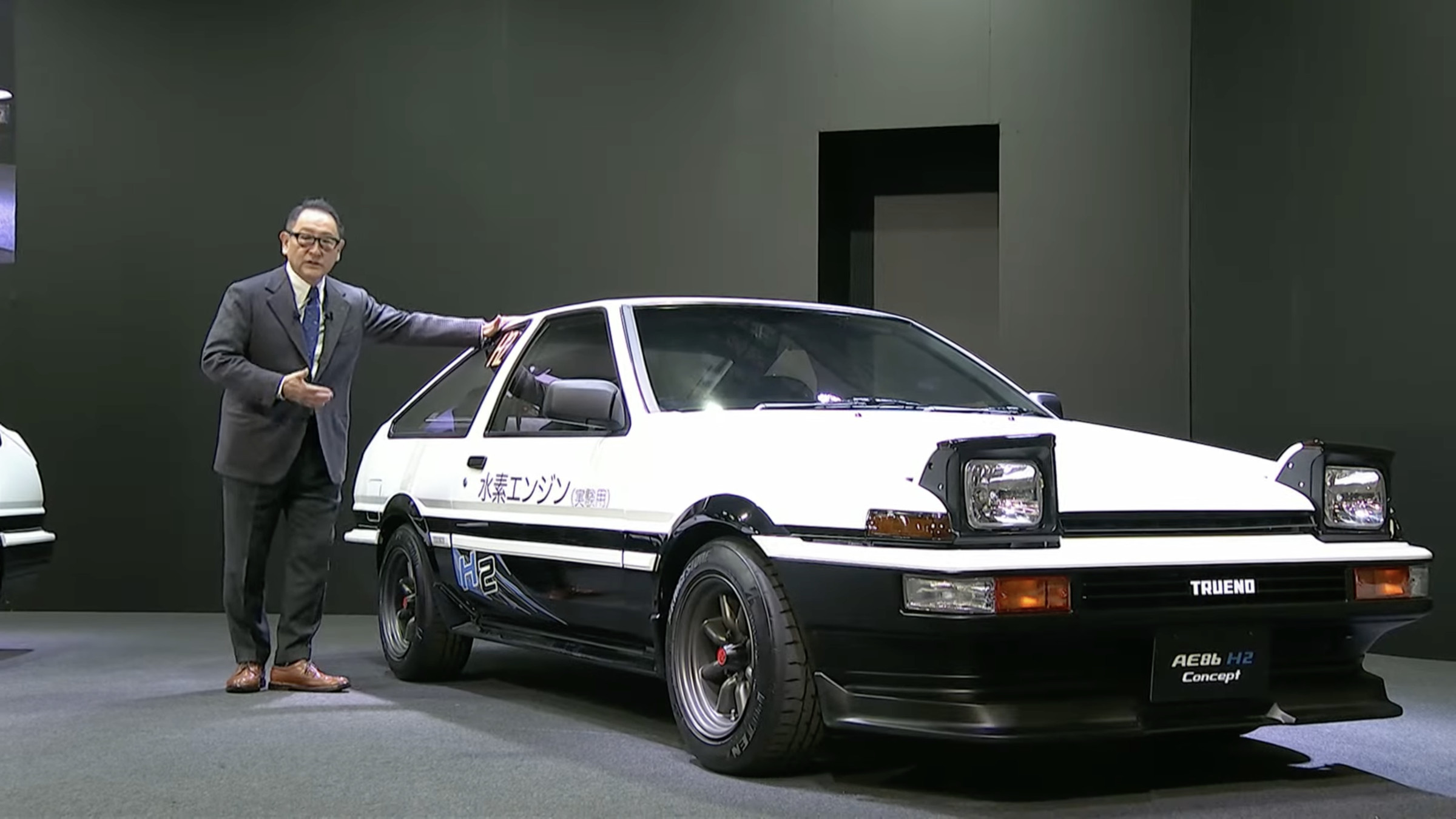 Image of the AE86 H2 with its headlights popped out.