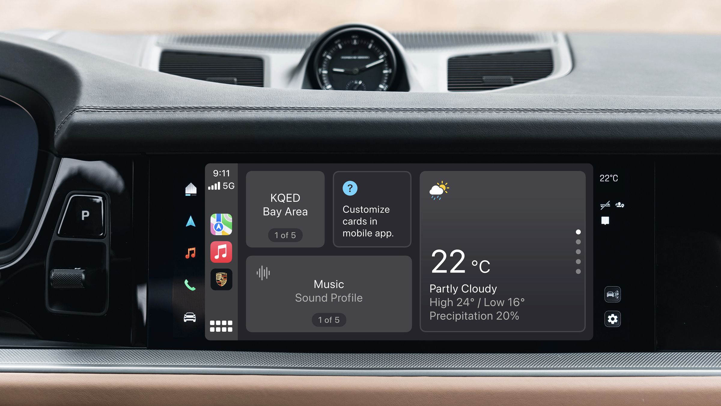 CarPlay interface in a porsche cayanne showing a weather widget alongside a music profiles switcher.