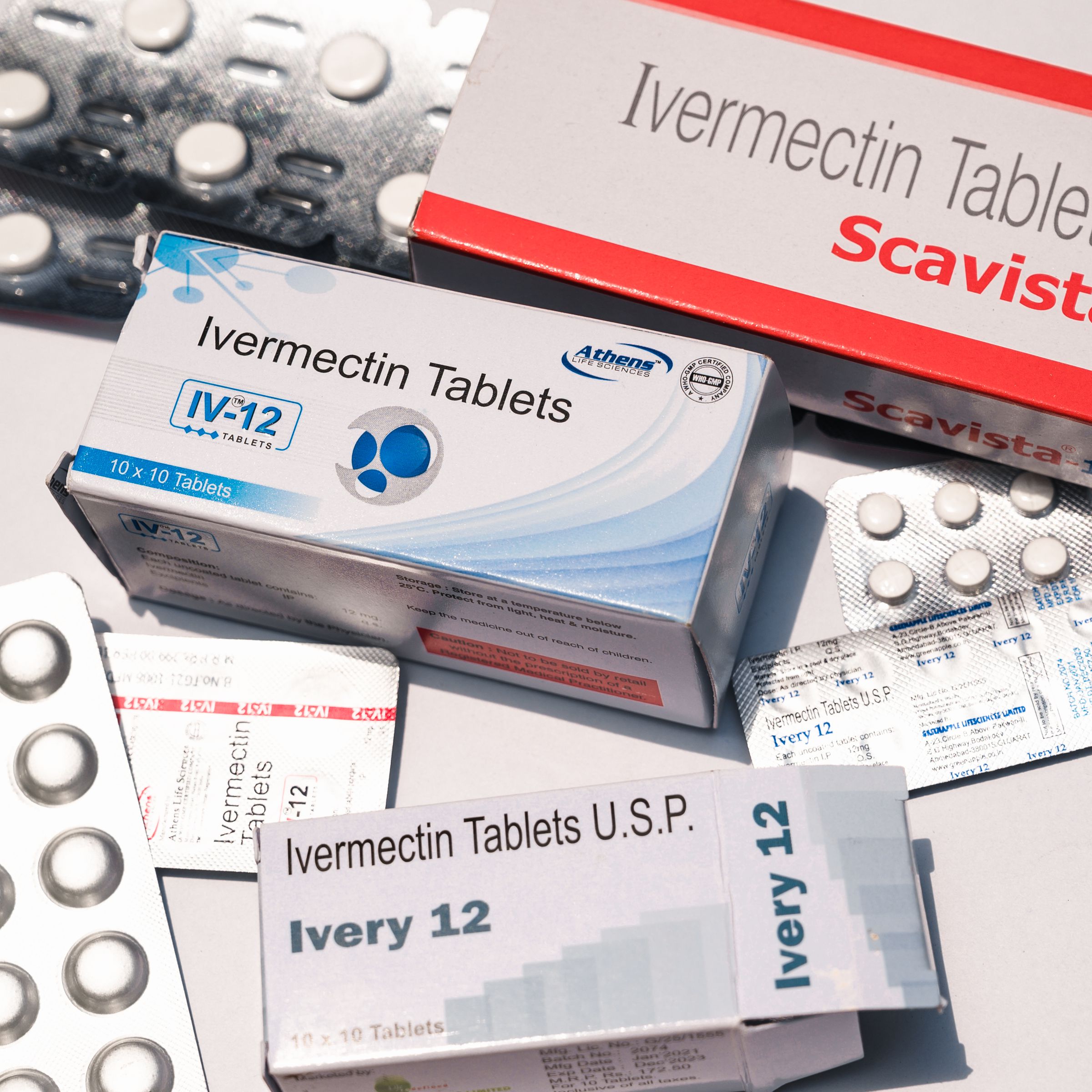 An assortment of boxes and blister packs of ivermectin.