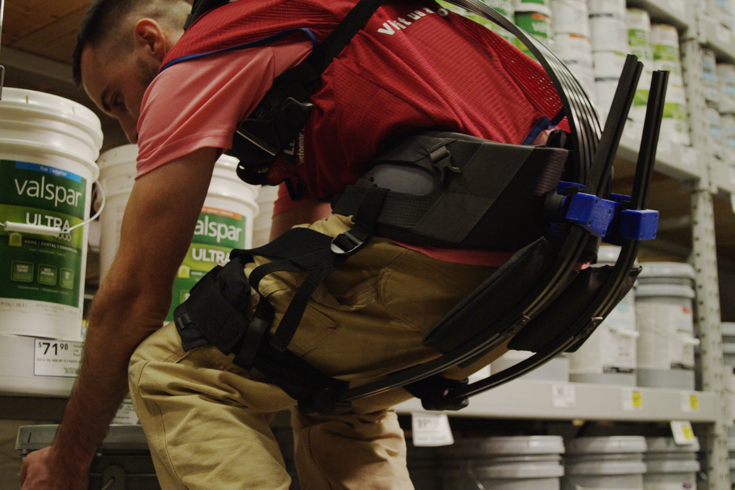 A Lowe’s employee wearing the company prototype exoskeleton.