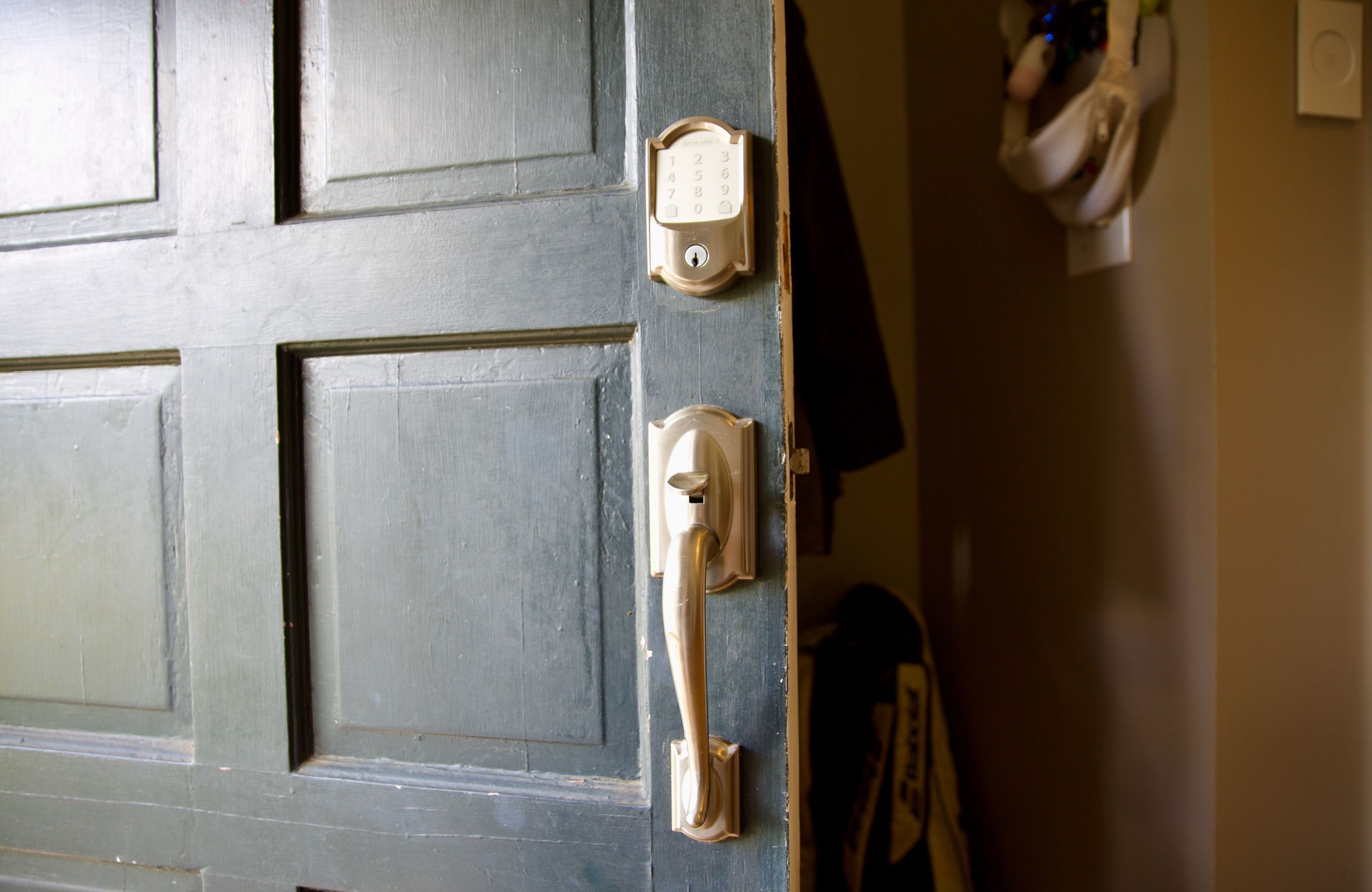 A door lock and door handle set on an open door