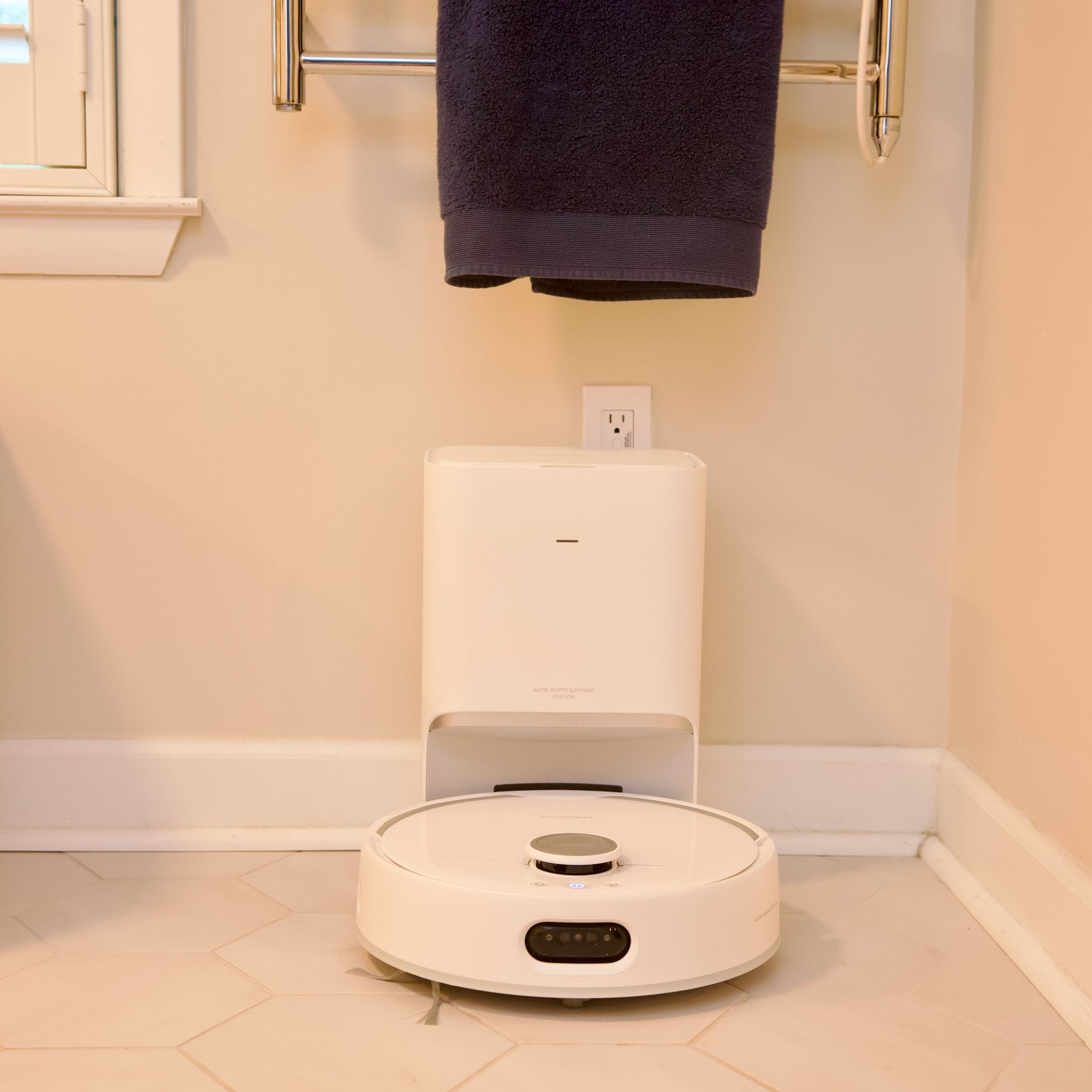 The SwitchBot S10 has two docks, a regular charging station that auto-empties, and a separate water station that can hook into your plumbing.