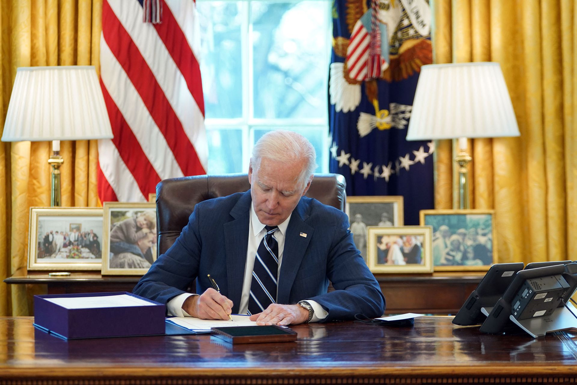 Biden revokes and replaces Trump orders banning TikTok and WeChat The