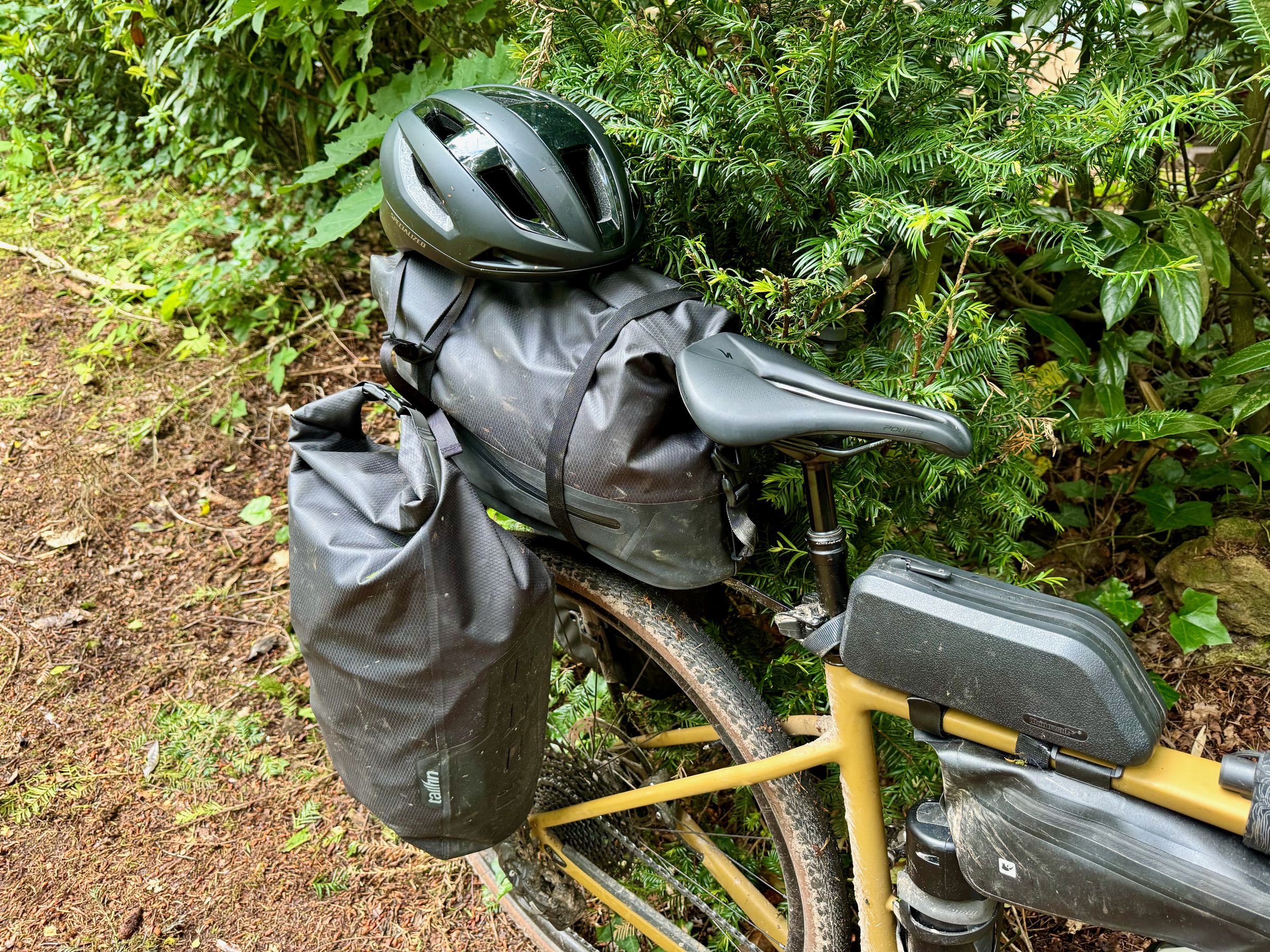 The top bag and two panniers create 50L of quick-release and waterproof storage.