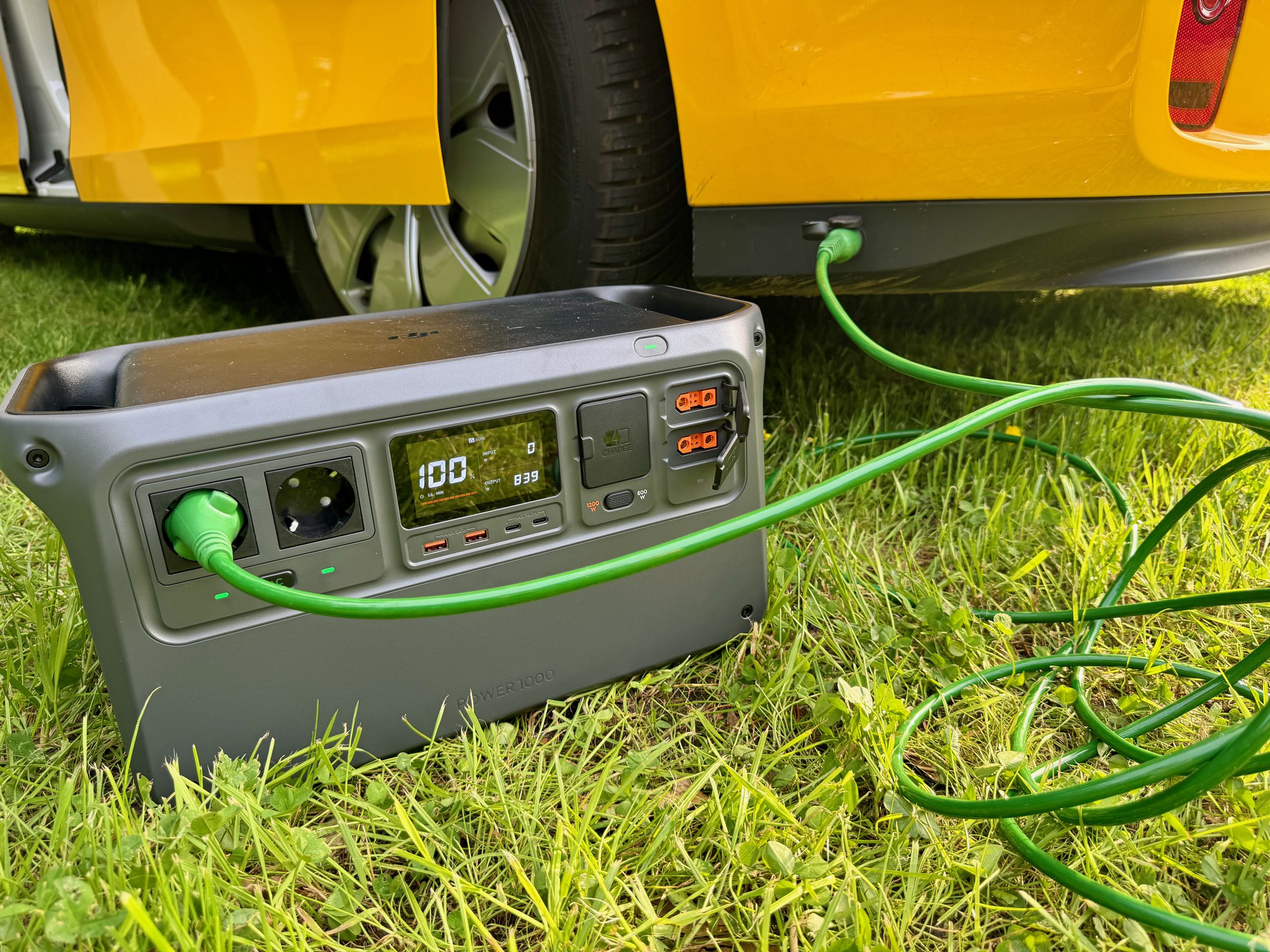 <em>Using shore power cable to plug eVentje into a standard AC jack on a DJI power station. </em>