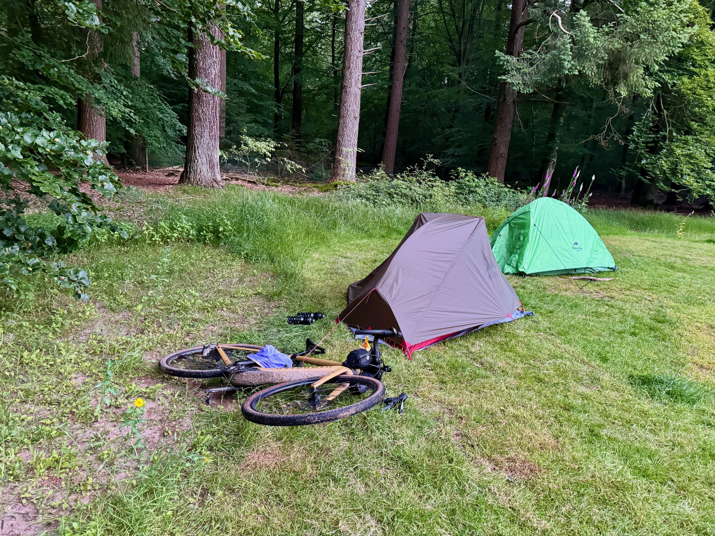 <em>Pro tip: Stake your tent lines through your bike and when someone tries to steal it your collapsing tent will alert you, assuming you can still get out.</em>