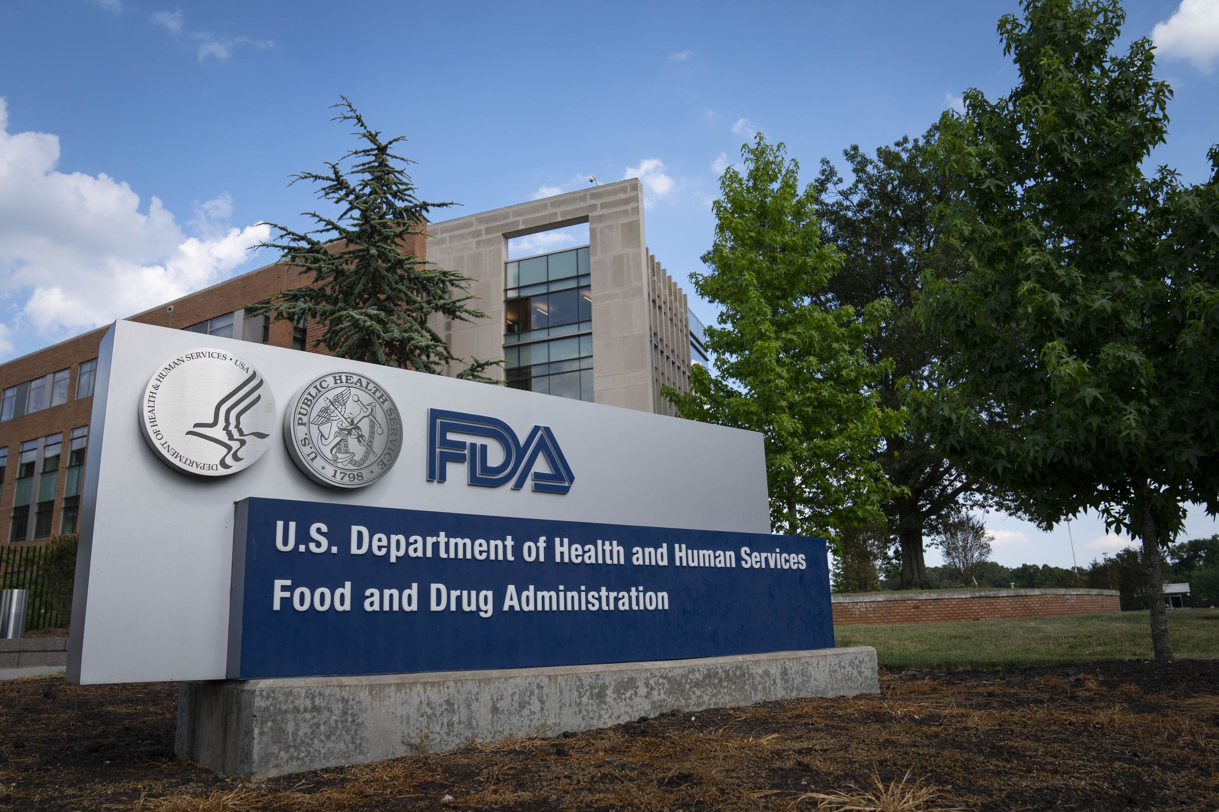 Photo of a sign outside a large building that reads “US Department of Health and Human Services, Food and Drug Administration”