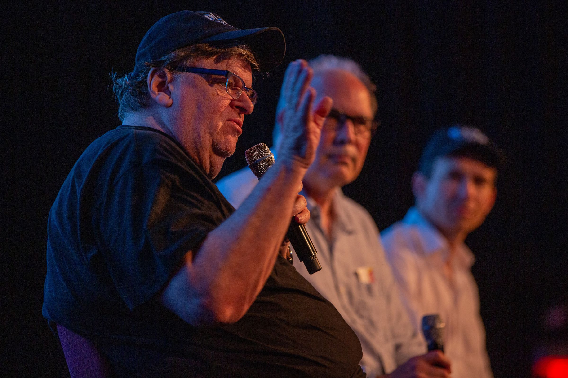 ‘Planet of the Humans’ executive producer Michael Moore with director Jeff Gibbs and producer Ozzie Zehner at the Traverse City Film Festival.