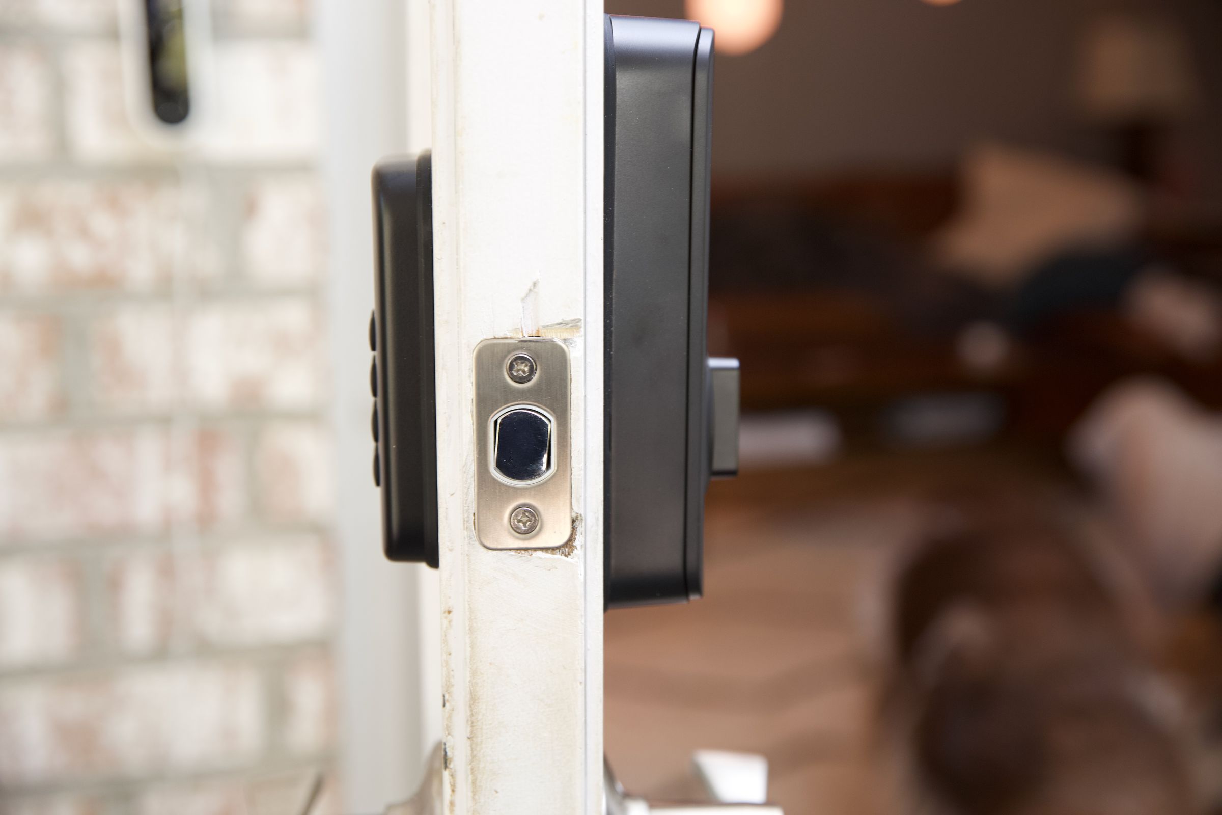 The Wyze lock has a huge rear housing but a nice slimline keypad, a fast fingerprint reader, and no Wi-Fi connection.