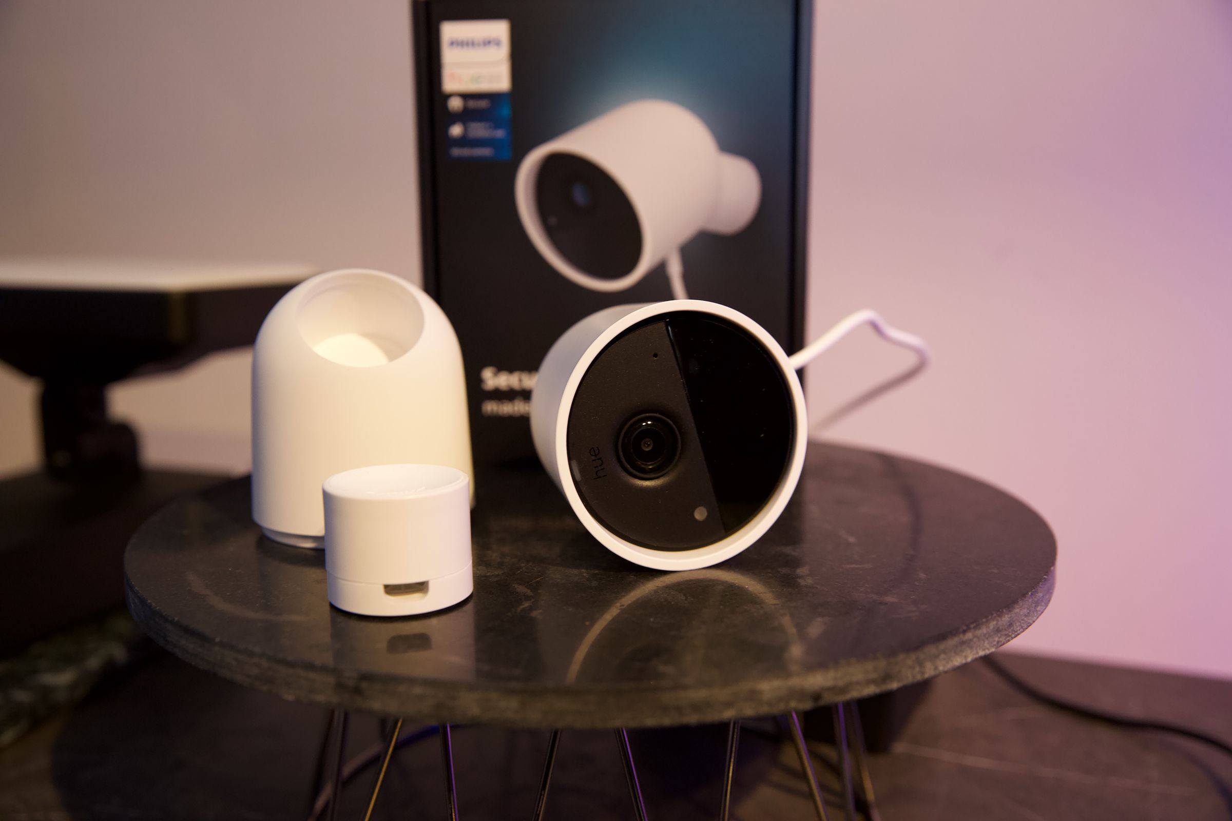 The indoor camera with its magnetic mount and “desktop” stand. 