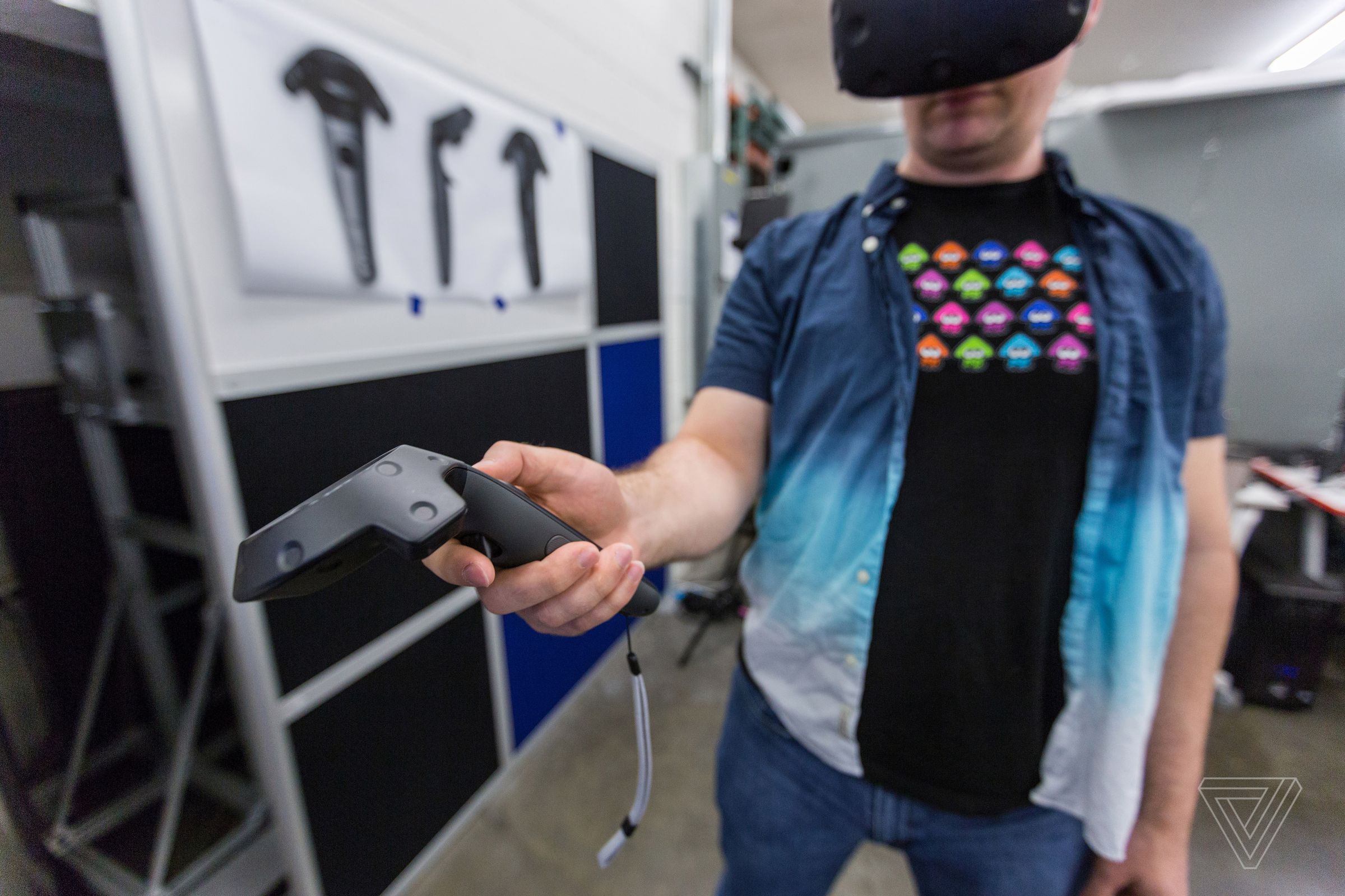 Chris Hayes, a Kindred VR pilot and software engineer, operates the Orb remotely using a Vive headset in the company’s San Francisco office. 