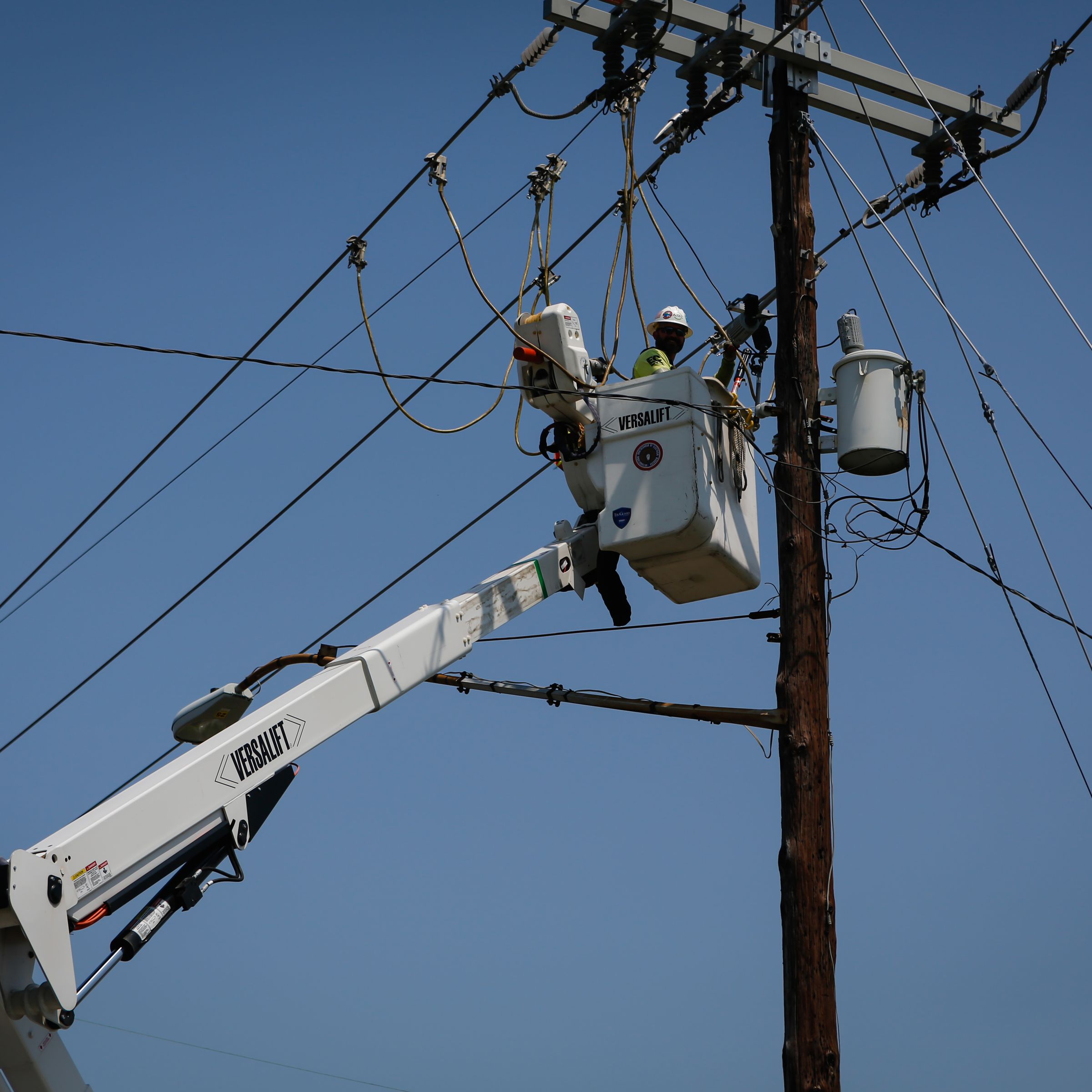 A worker repairs a utility pole during a power outage after Hurricane Ida in New Orleans, Louisiana, U.S., on Thursday, September 2nd, 2021.