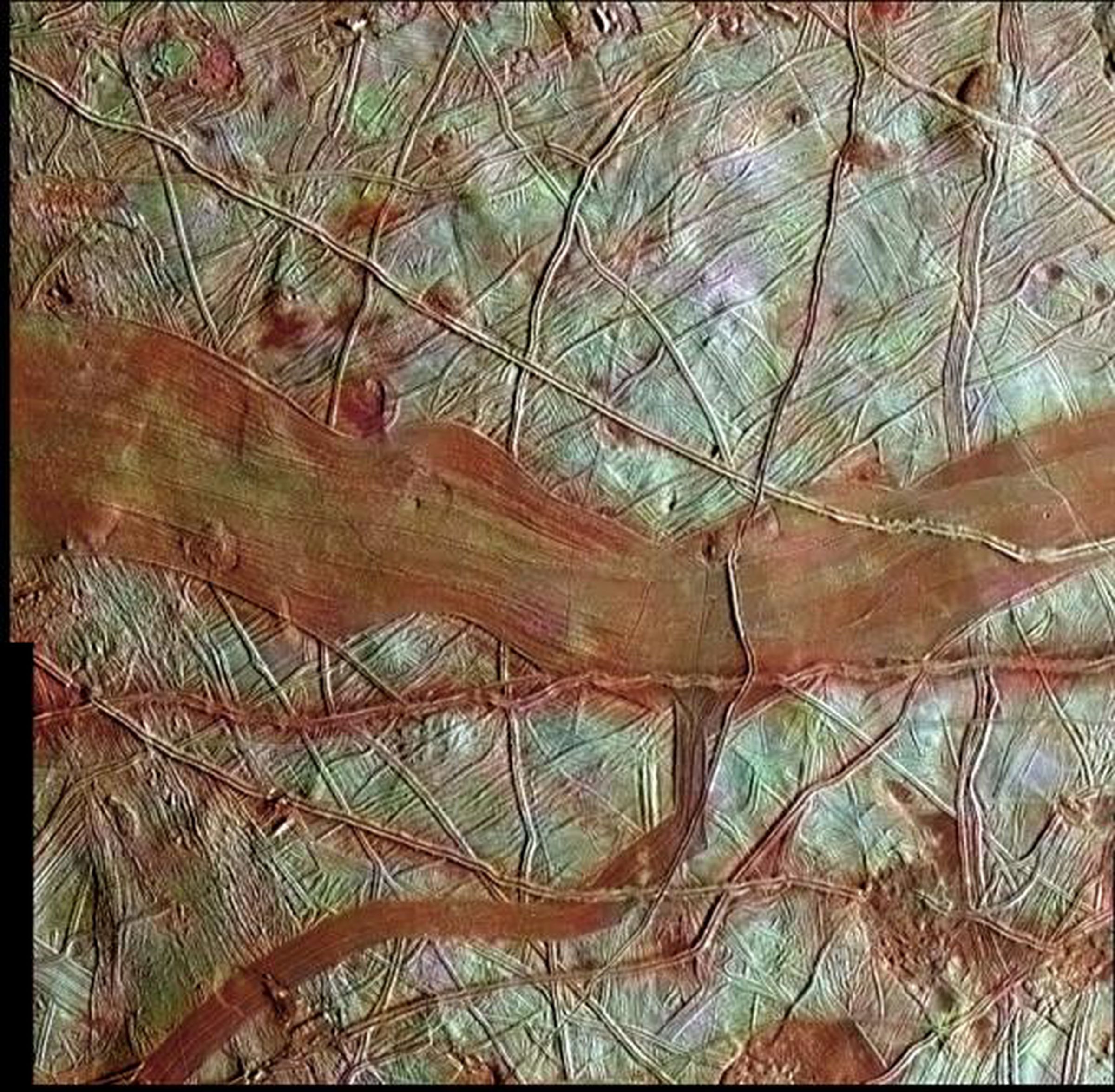 Red bands on the surface of Europa, as seen by NASA’s Galileo probe