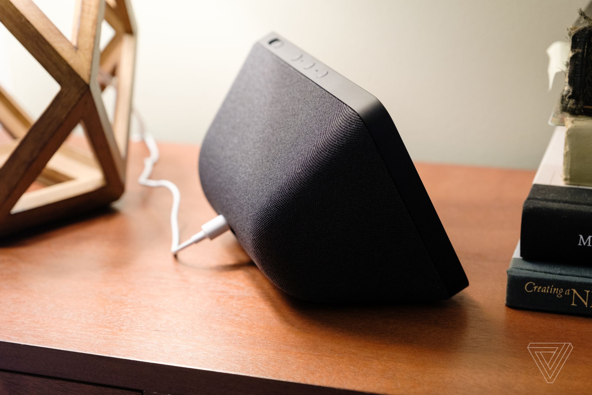 The wedge-shaped design houses two speaker drivers that put out impressive volume for its size.