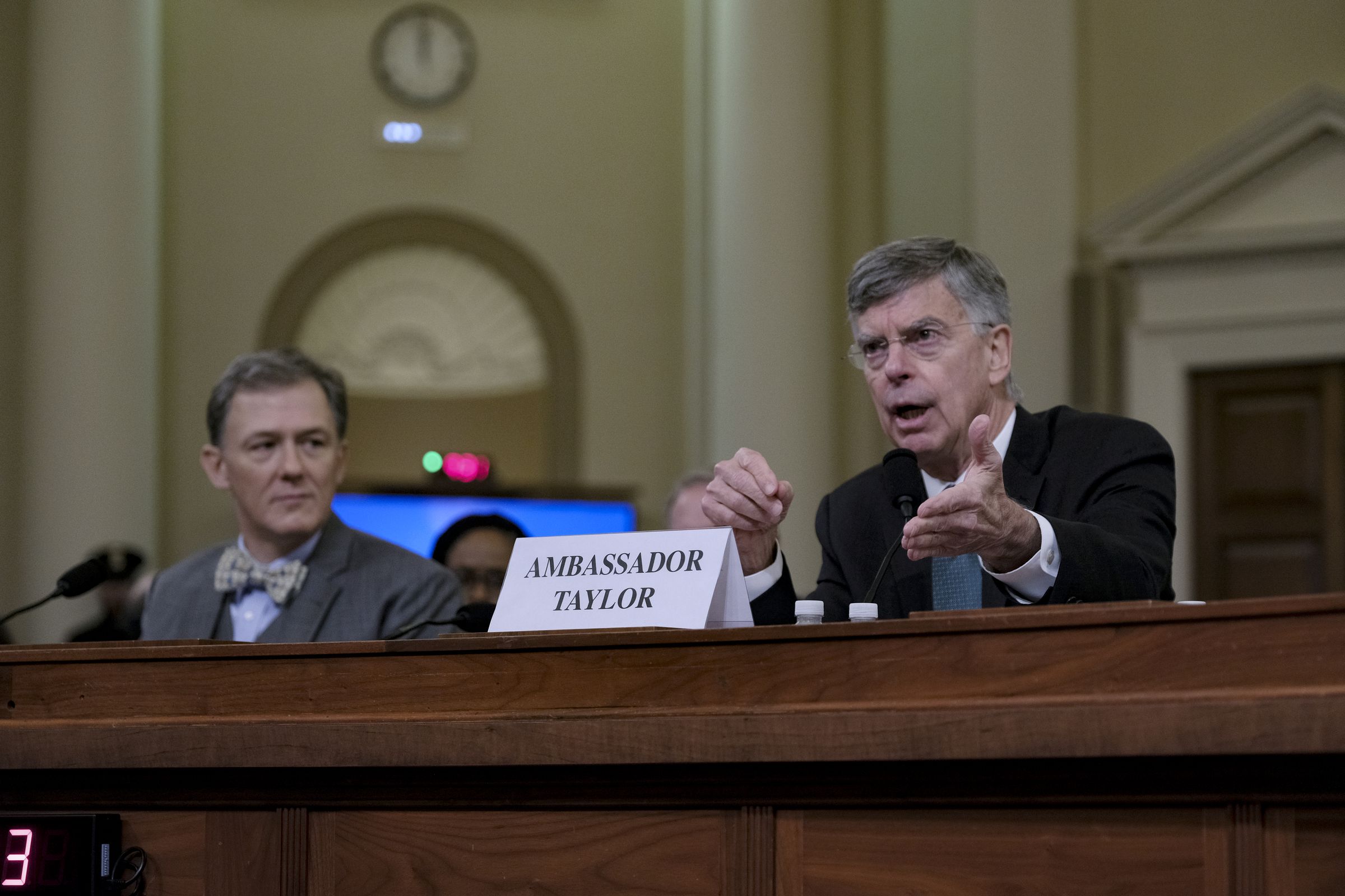 Ambassador William Taylor, right, speaks, along with Deputy Assistant Secretary George Kent appear during an impeachment inquiry in Washington, D.C. on November 13