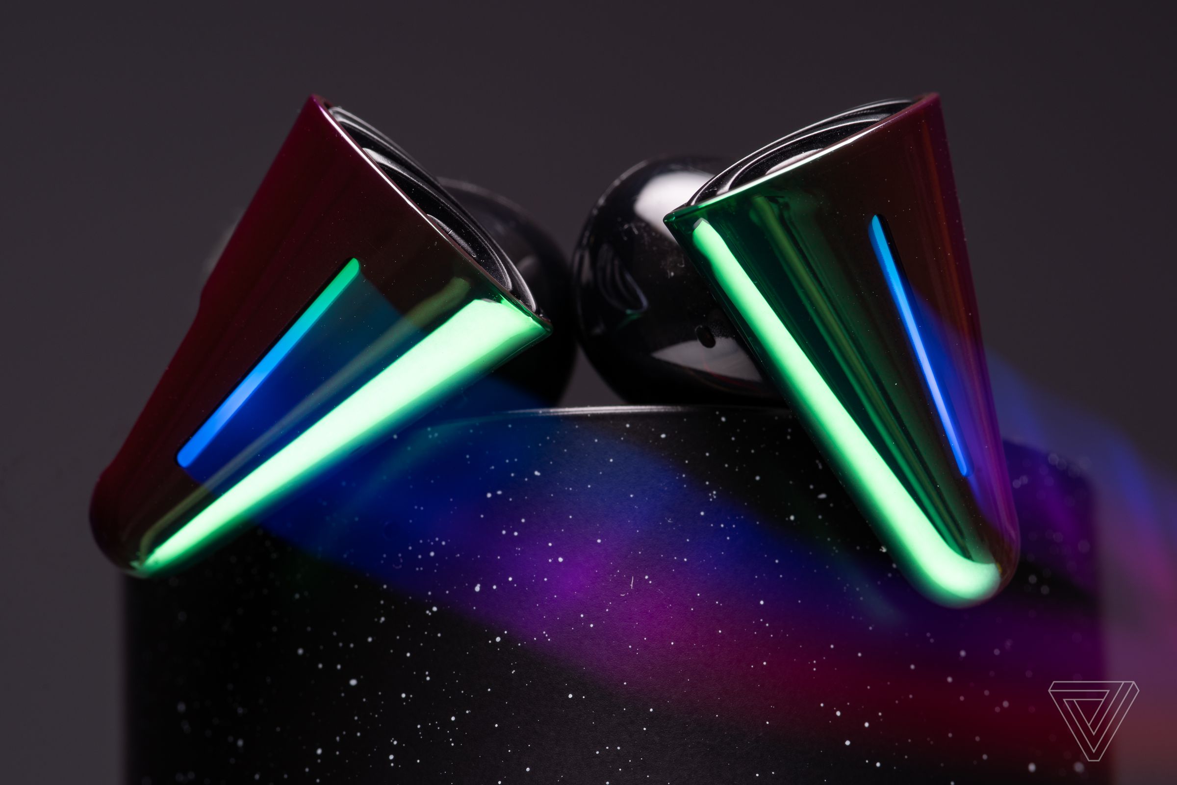 The Cyberblades feature a unique design, customizable RGB lighting, and a charging case with a starry sky aesthetic.