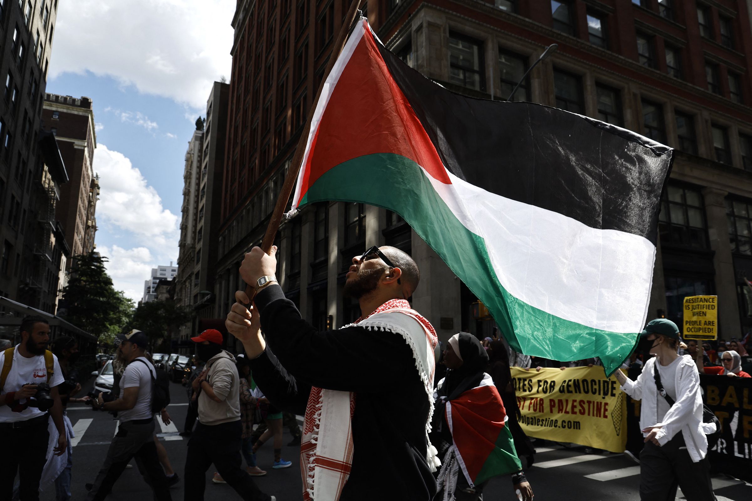 Demonstrators wave Palestinian flags and hold banners as they rally through the streets against the conflict in Gaza and the occupied West Bank on September 2nd, 2024, in New York City.