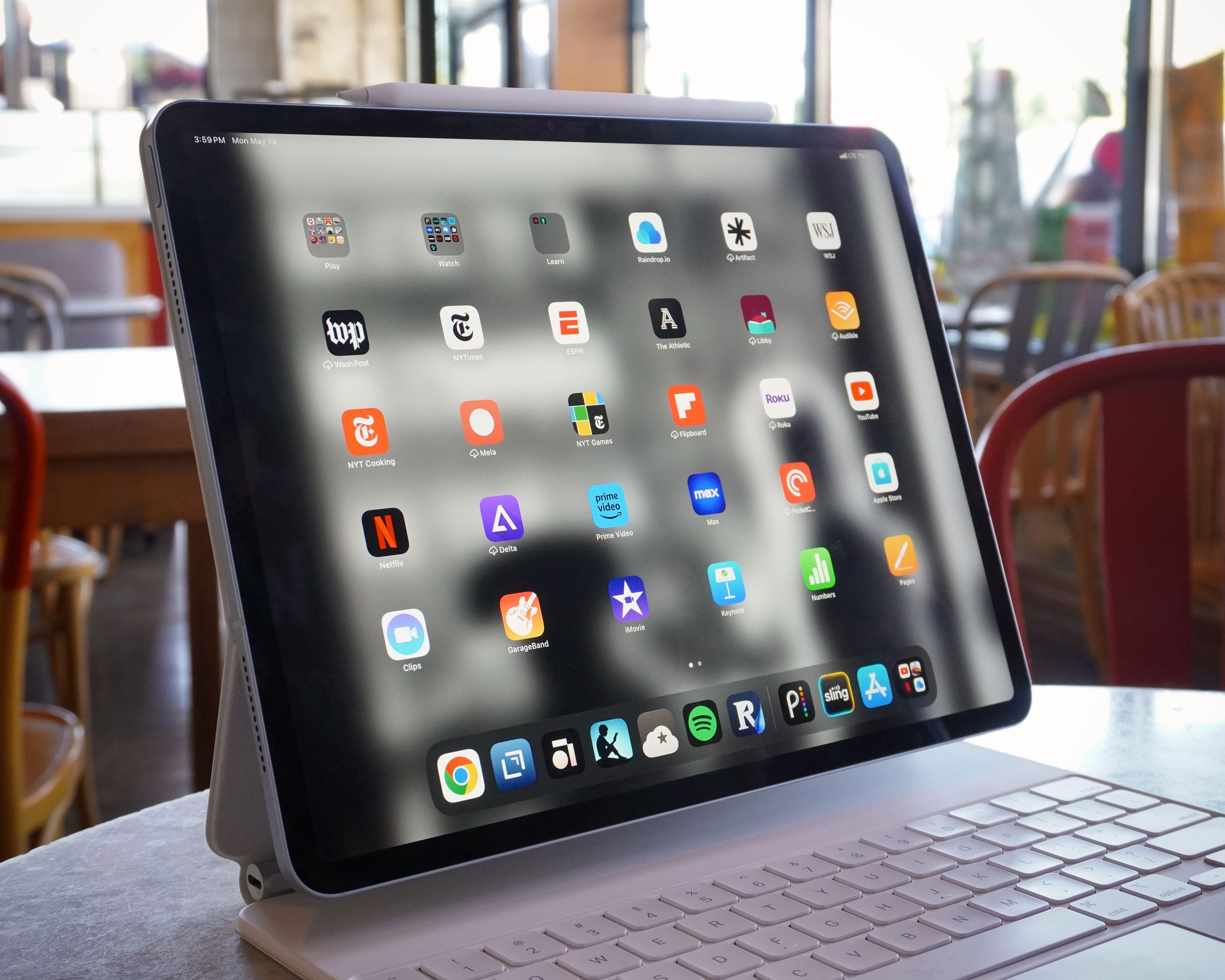 A photo of the iPad Air in a cafe setting.