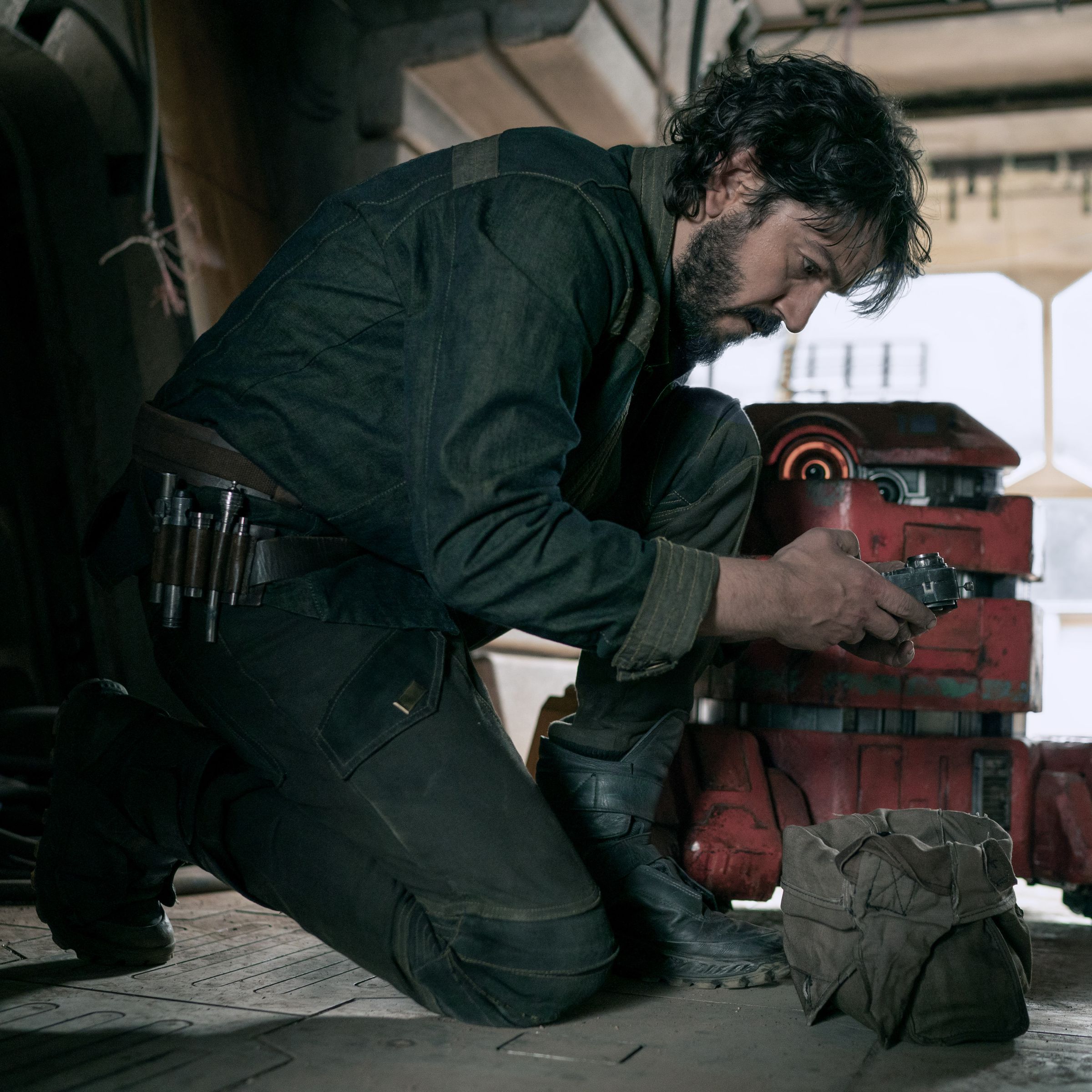 A photo of Diego Luna and the droid B2EMO in the Star Wars series Andor.