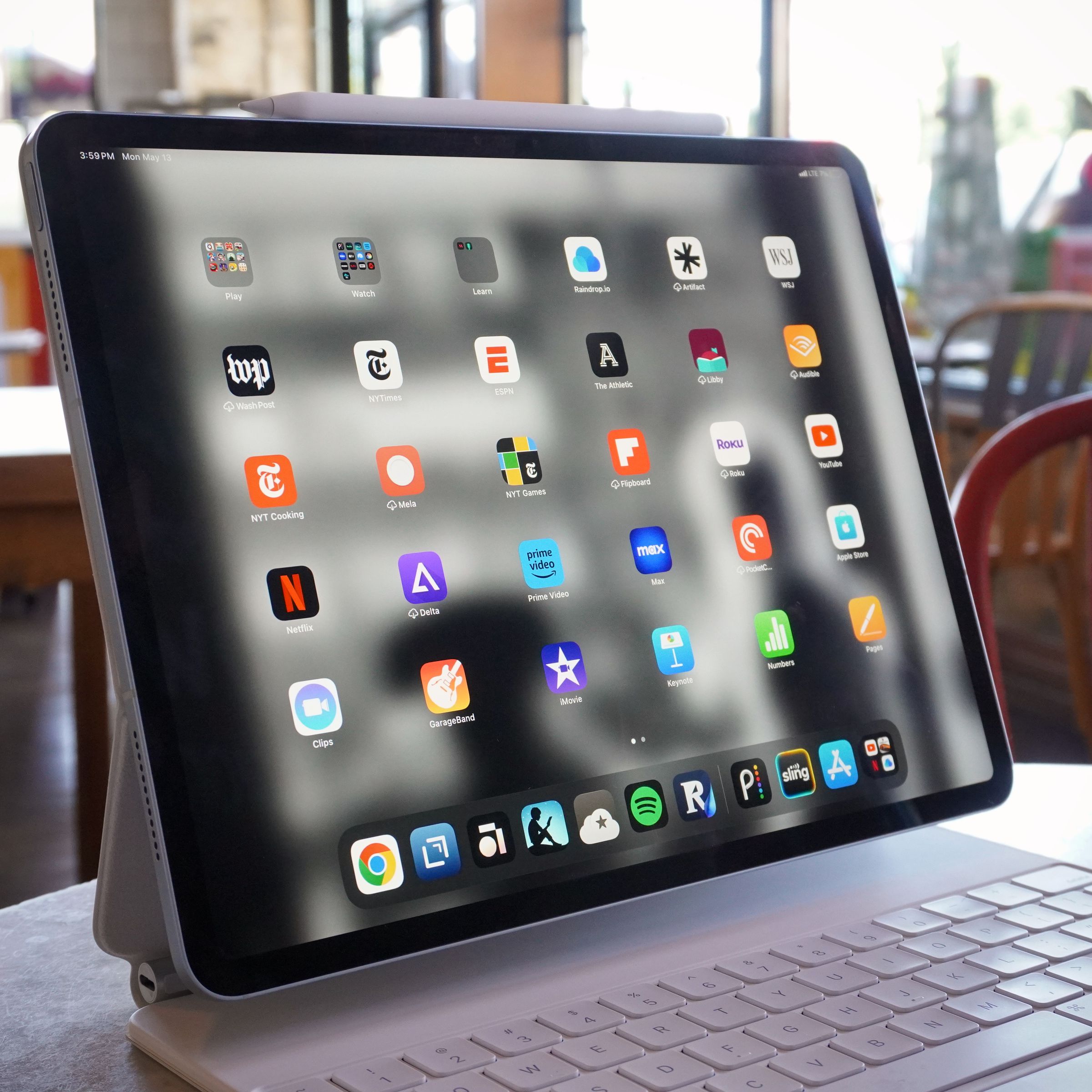 A photo of the iPad Air in a cafe setting.