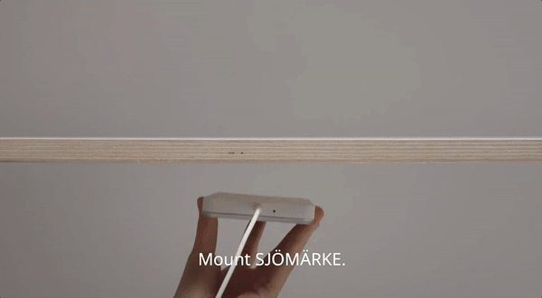 Ikea’s Sjömärke fits under a table to make it a charger. 
