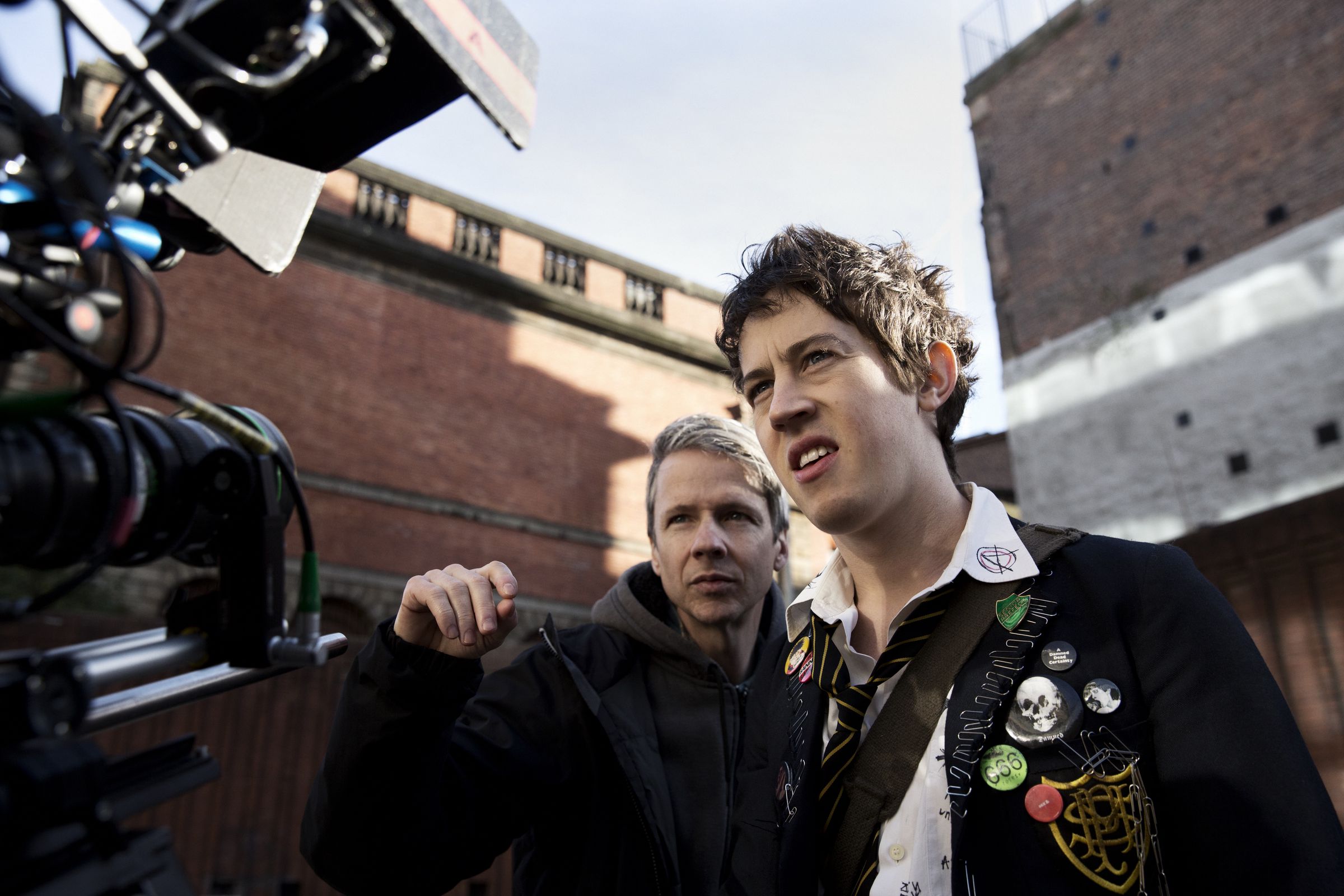John Cameron Mitchell and Alex Sharp on the set of How to Talk to Girls at Parties.