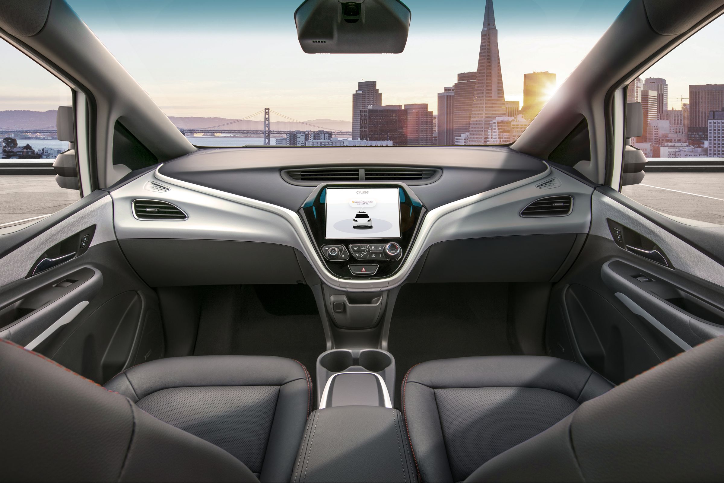 GM is designing all-electric Chevy Bolts with no steering wheel or pedals, and will launch a commercial trial with the Bolts it has retrofitted with Cruise Automation’s technology in 2019.
